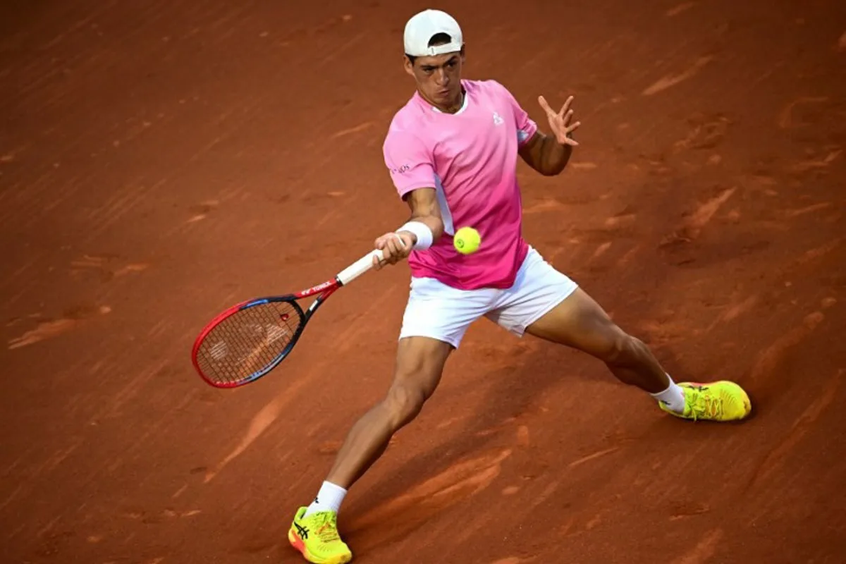 Argentina's Sebastian Baez returns the ball to France's Alexandre Muller during the ATP 500 Rio Open final tennis match at the Gavea Jockey Club in Rio de Janeiro, Brazil, on February 23, 2025.  MAURO PIMENTEL / AFP