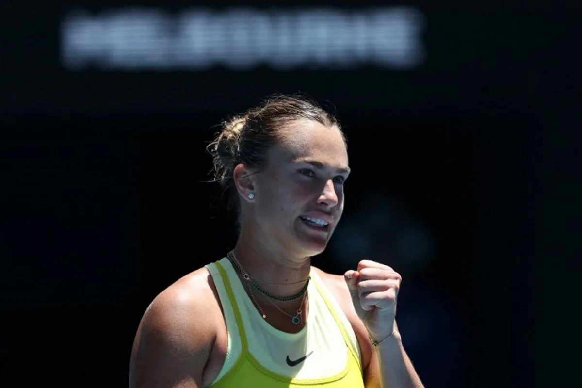 Belarus' Aryna Sabalenka reacts after a point against Denmark's Clara Tauson during their women's singles match on day six of the Australian Open tennis tournament in Melbourne on January 17, 2025.  Martin KEEP / AFP