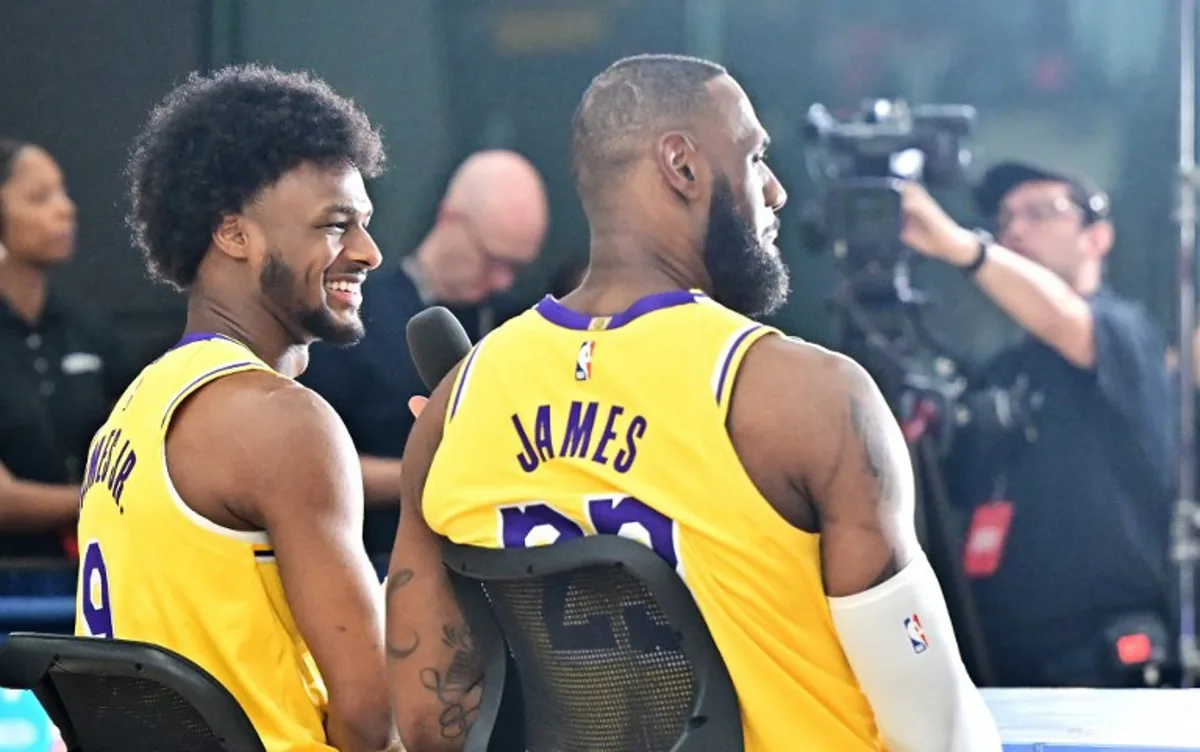 Los Angeles Lakers #23 LeBron James and his son #9 Bronny James attend the Lakers media day at UCLA Health Training Center in El Segundo, California, September 30, 2024.  Frederic J. BROWN / AFP