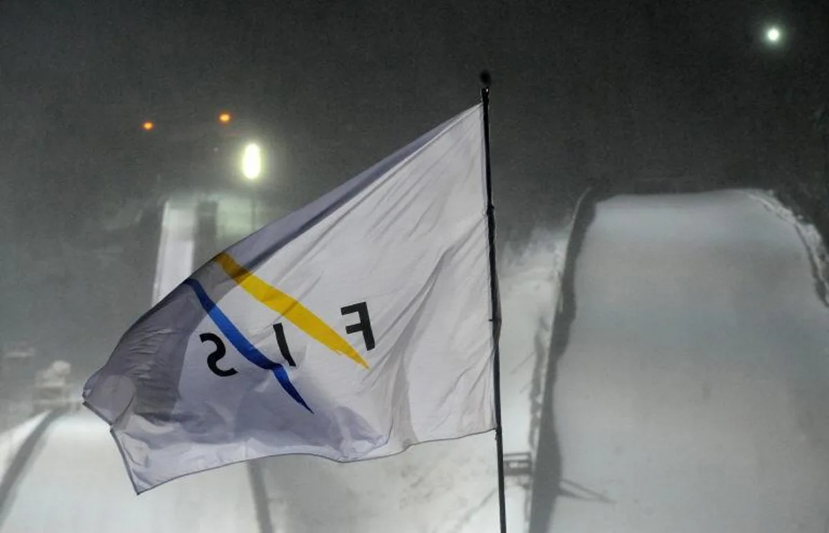 This picture taken on December 2010 at the Harrachov's ski jump hill shows a flag of International Ski Federation (FIS) blowing in the wind as the FIS Ski Jumping World Cup has been delayed due to a strong wind. AFP PHOTO/MICHAL CIZEK Michal CIZEK / AFP