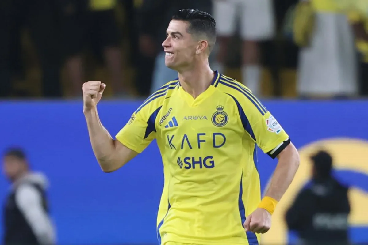 Nassr's Portuguese forward #7 Cristiano Ronaldo celebrates scoring his team's second goal during the Saudi Pro League football match between Al-Nassr and Al-Shabab at Al-Awwal Park in Riyadh on March 7, 2025.  Fayez NURELDINE / AFP