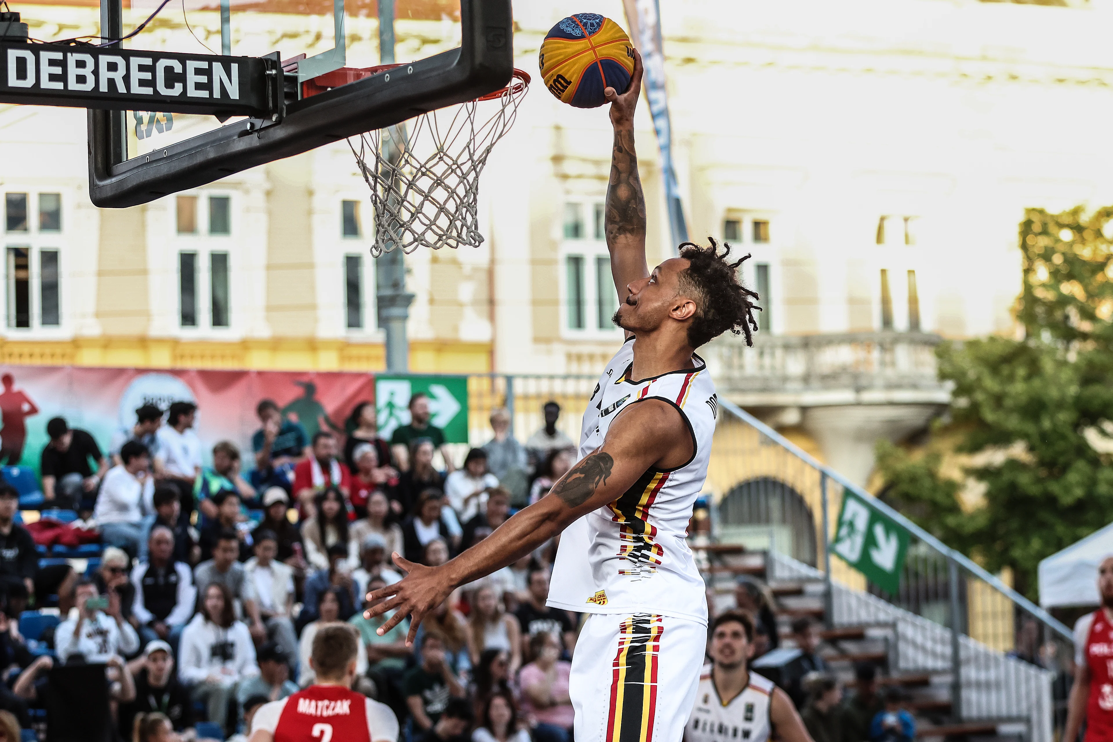 Belgian Dennis Donkor dunks during a third game in the group stage between Belgium and Poland in the group D at the Olympic qualification tournament for the 2024 Olympics, in Debrecen, Hungary, Saturday 18 May 2024. BELGA PHOTO NIKOLA KRSTIC