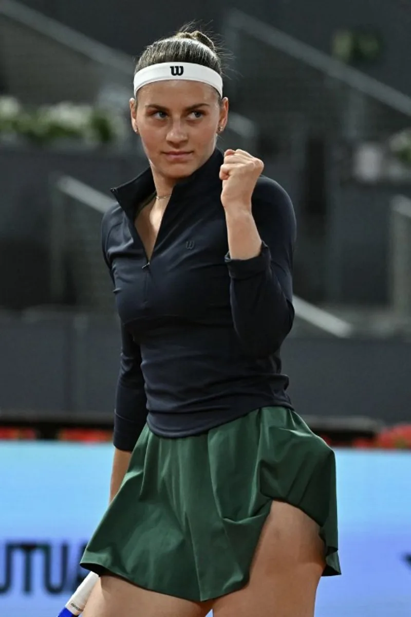 Ukraine's Marta Kostyuk reacts during her 2026 WTA Tour Madrid Open tennis tournament women's semi-final singles match against Austria's Anastasia Potapova at the Caja Magica in Madrid, on April 30, 2026.  Javier SORIANO / AFP