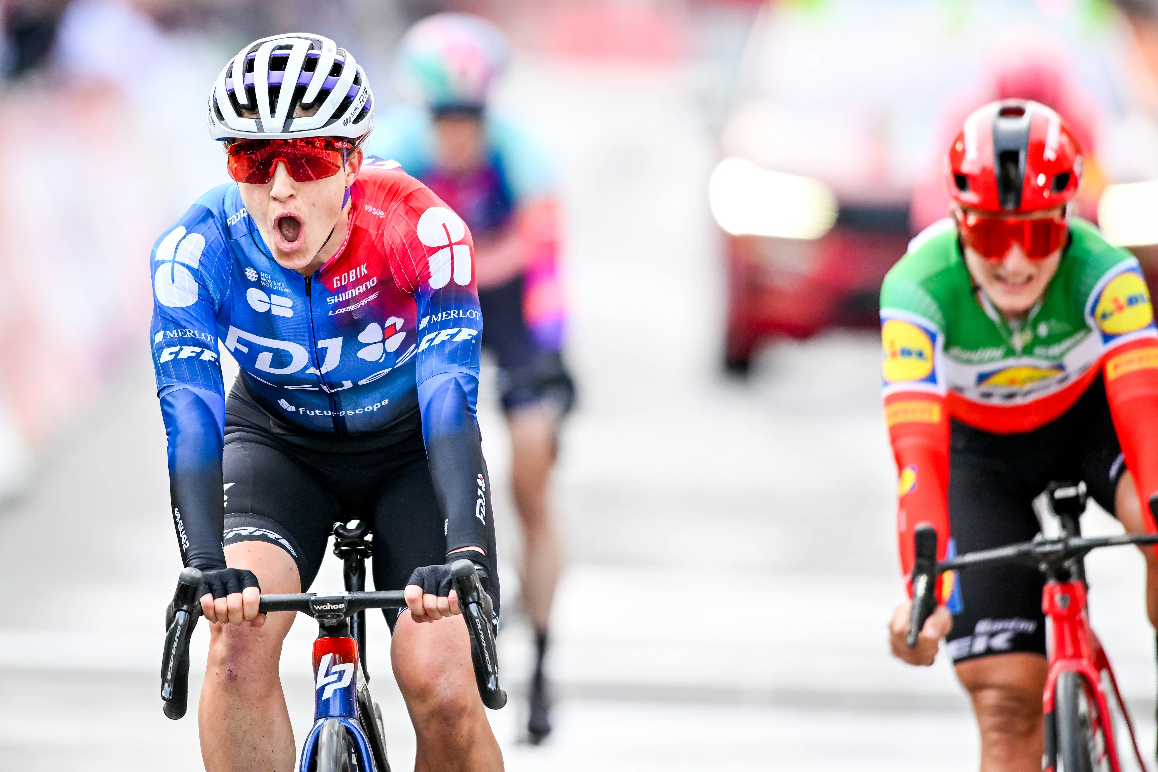 New Zealand's Grace Brown of FDJ-Suez celebrates as she crosses the finish line to win the women elite race of the Liege-Bastogne-Liege one day cycling event, 147,6 km from Liege, over Bastogne to Liege, Sunday 21 April 2024. BELGA PHOTO ERIC LALMAND