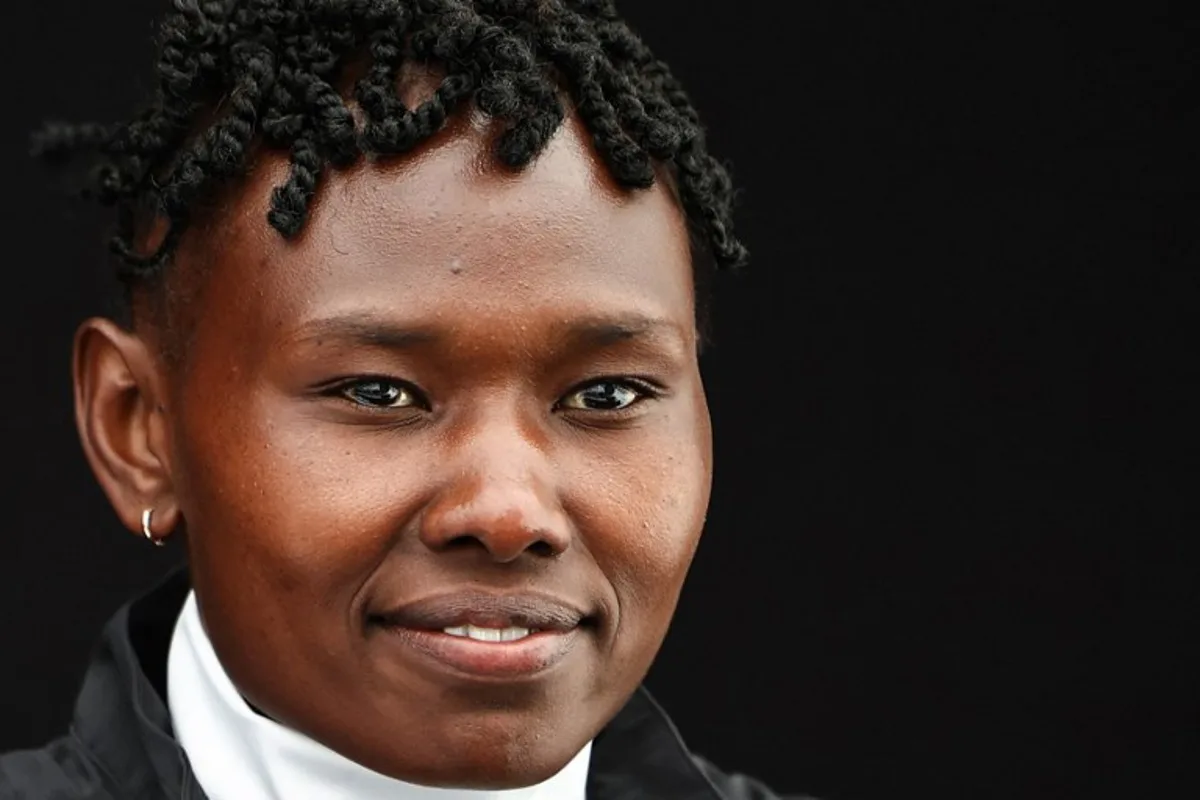 Kenya's Ruth Chepngetich poses for pictures during the Women's Elite Press Conference, in central London, on April 18, 2024, ahead of the London Marathon.    HENRY NICHOLLS / AFP