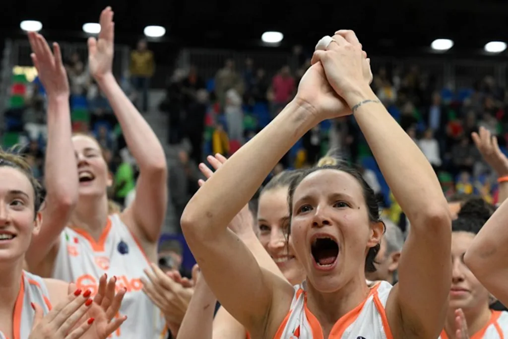 Players of Schio celebrate after defeating USK Prague in their third place match of the Euroleague Women's Final Four 2023 basketball match between USK Prague and Schio in Prague on April 16, 2023.  Michal Cizek / AFP