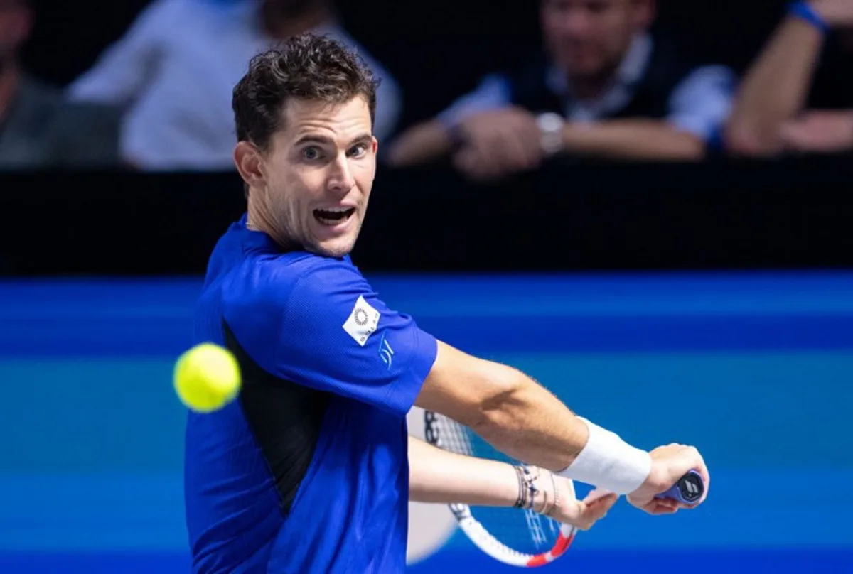 Austria's Dominic Thiem returns the ball to Italy's Luciano Darderi (not in picture) during their Tennis match of the Vienna Open at the Stadthalle in Vienna, Austrian on October 22, 2024.  GEORG HOCHMUTH / APA / AFP