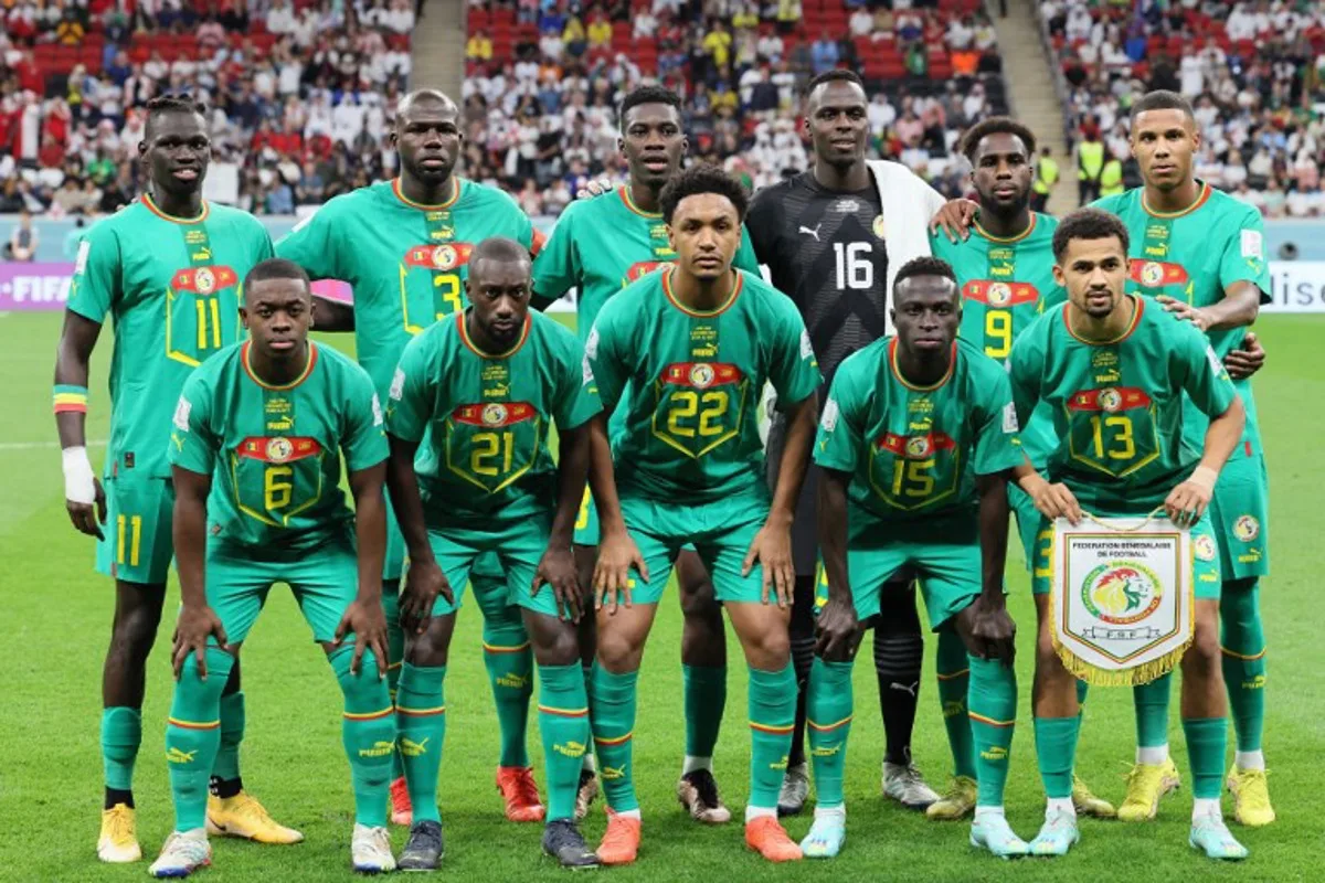 Players of Senegal pose for the team picture ahead of the Qatar 2022 World Cup round of 16 football match between England and Senegal at the Al-Bayt Stadium in Al Khor, north of Doha on December 4, 2022.  JACK GUEZ / AFP