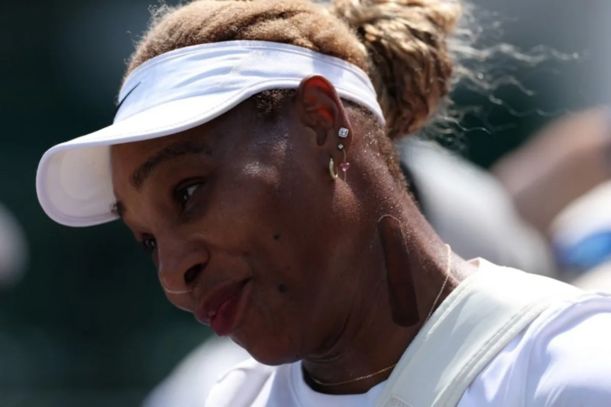 US player Serena Williams practices on court 12 at The All England Lawn Tennis and Croquet Club in Wimbledon, southwest London, on June 27, 2026, ahead of the 2026 Wimbledon Championships.  Adrian Dennis / AFP