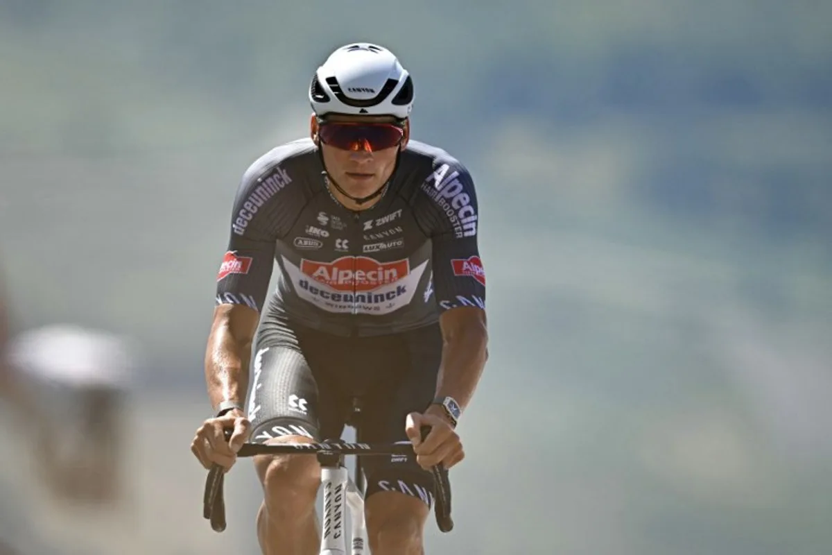 Alpecin - Deceuninck team's Dutch rider Mathieu van der Poel cycles to the finish line of the 13th stage of the 112th edition of the Tour de France cycling race, 10.9 km individual time trial between Loudenvielle and Peyragudes, in the Pyrenees mountains of southwestern France, on July 18, 2025. Loic VENANCE / AFP