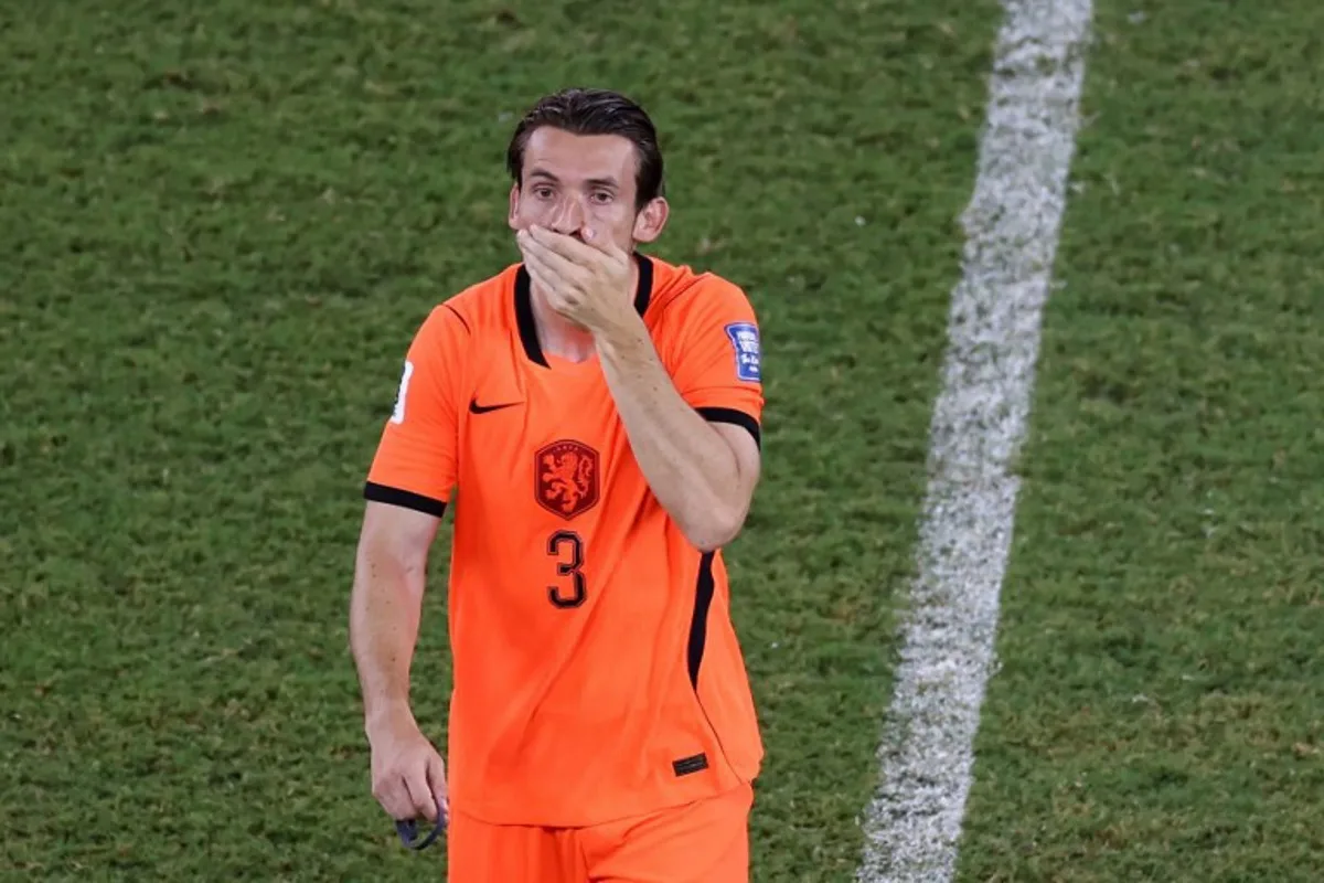 Netherlands' midfielder #03 Marten de Roon reacts after losing at the end of the 2026 World Cup round of 32 football match between the Netherlands and Morocco at the Monterrey Stadium in Guadalupe on June 29, 2026.   Julio Cesar AGUILAR / AFP