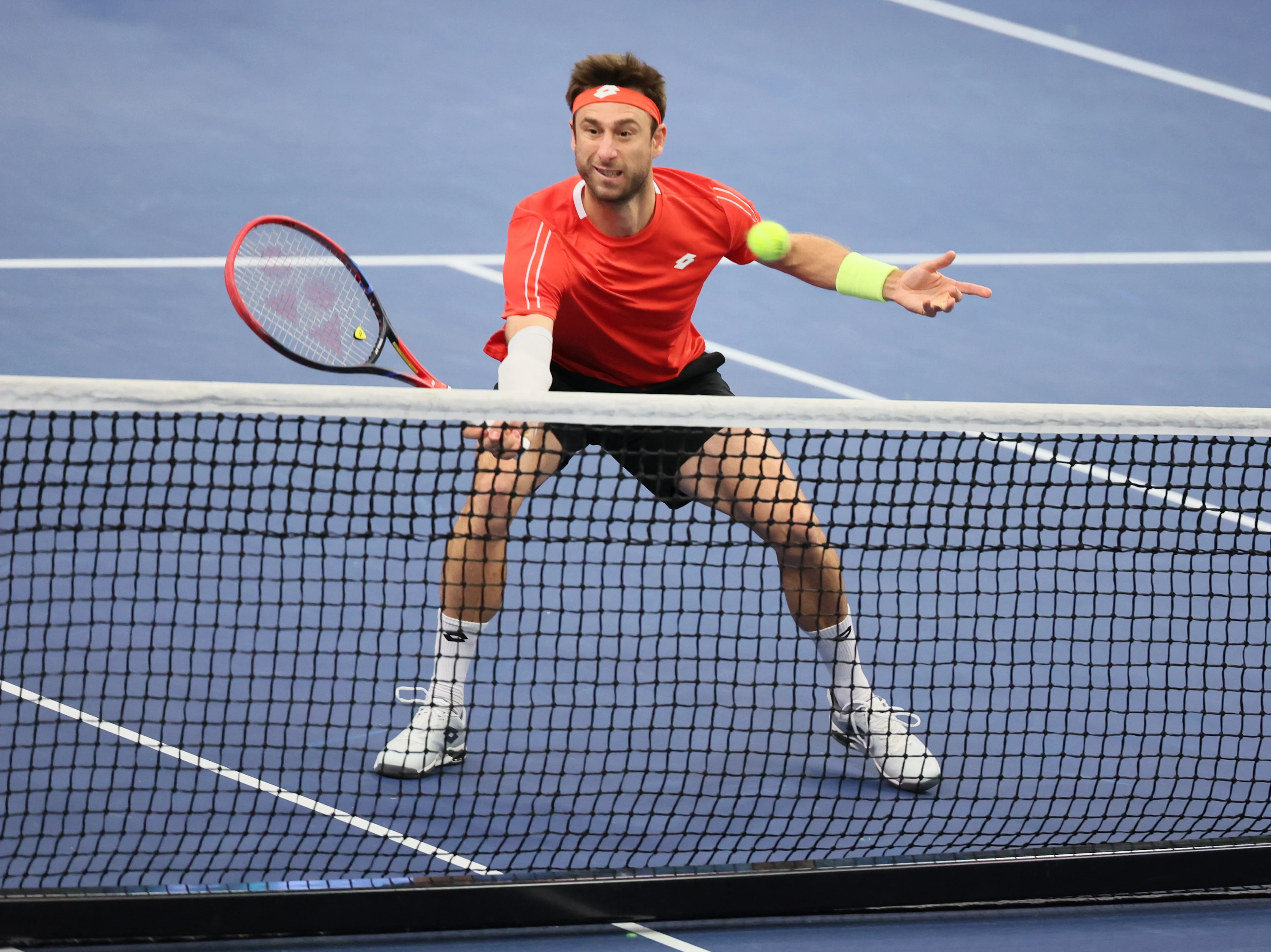 Belgian Sander Gille and pictured during a double game between Belgian pair Gille-Vliegen and Chilean pair Barrios Vera-Jarry, the third match in the Davis Cup qualifiers World Group tennis meeting between Belgium and Chile, , in Hasselt. BELGA PHOTO BENOIT DOPPAGNE