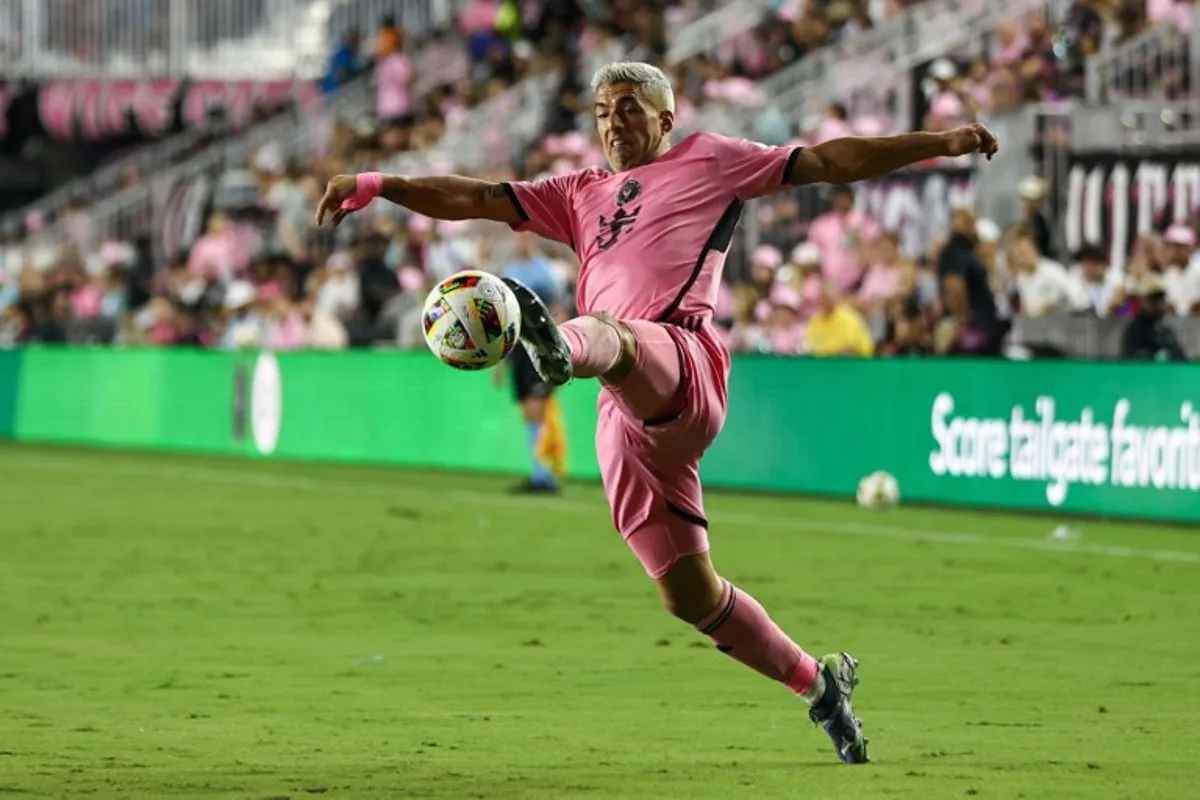 Inter Miami's Uruguayan forward #09 Luis Suarez controls the ball during the Major League Soccer (MLS) football match between Inter Miami and New England Revolution at Chase Stadium in Fort Lauderdale, Florida, October 19, 2024.  Chris Arjoon / AFP