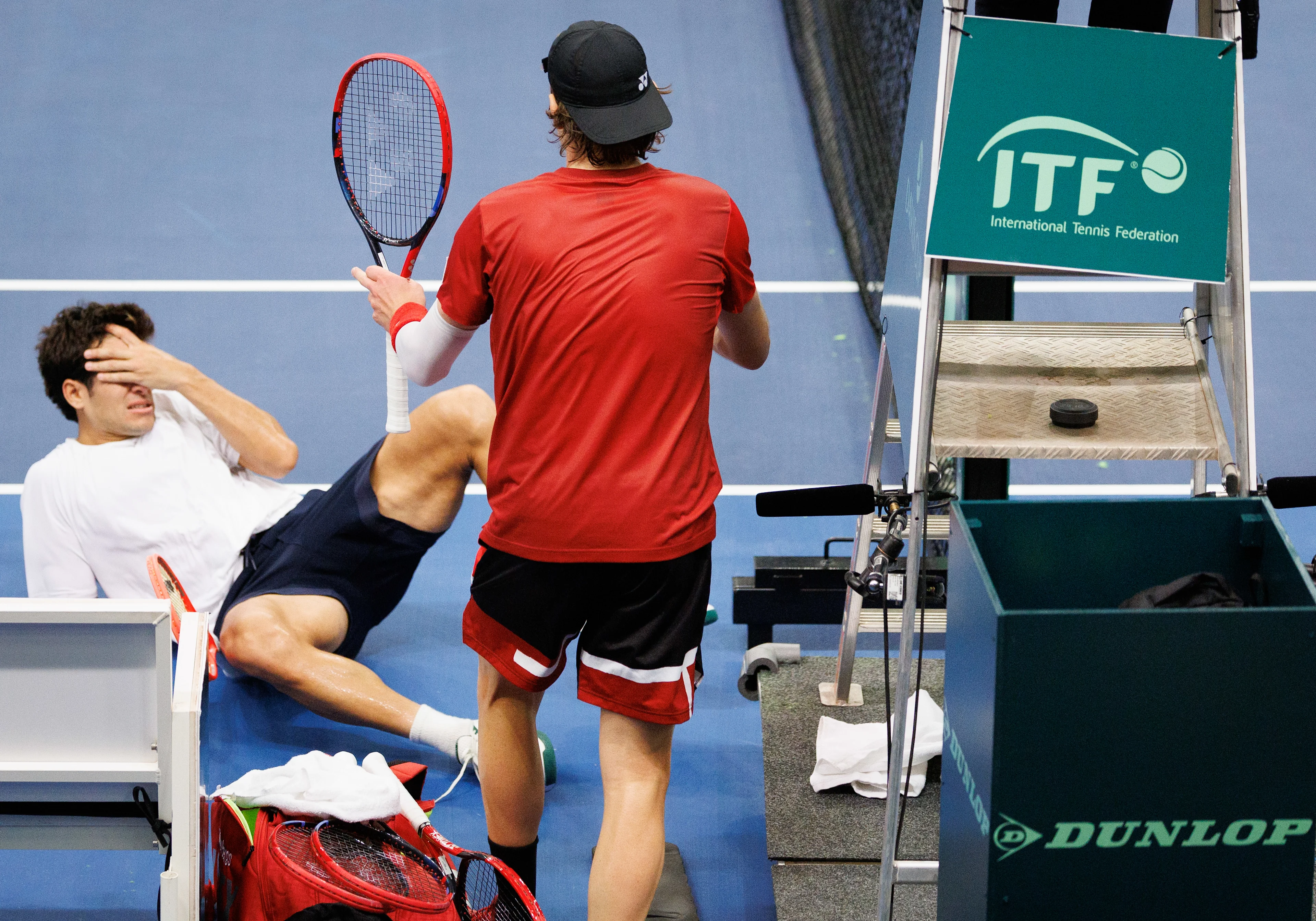 Chilean Cristian Garin and Belgian Zizou Bergs pictured during a game between Belgian Bergs and Chilean Garin, the fourth match in the Davis Cup qualifiers World Group tennis meeting between Belgium and Chile, Sunday 02 February 2025, in Hasselt. BELGA PHOTO BENOIT DOPPAGNE