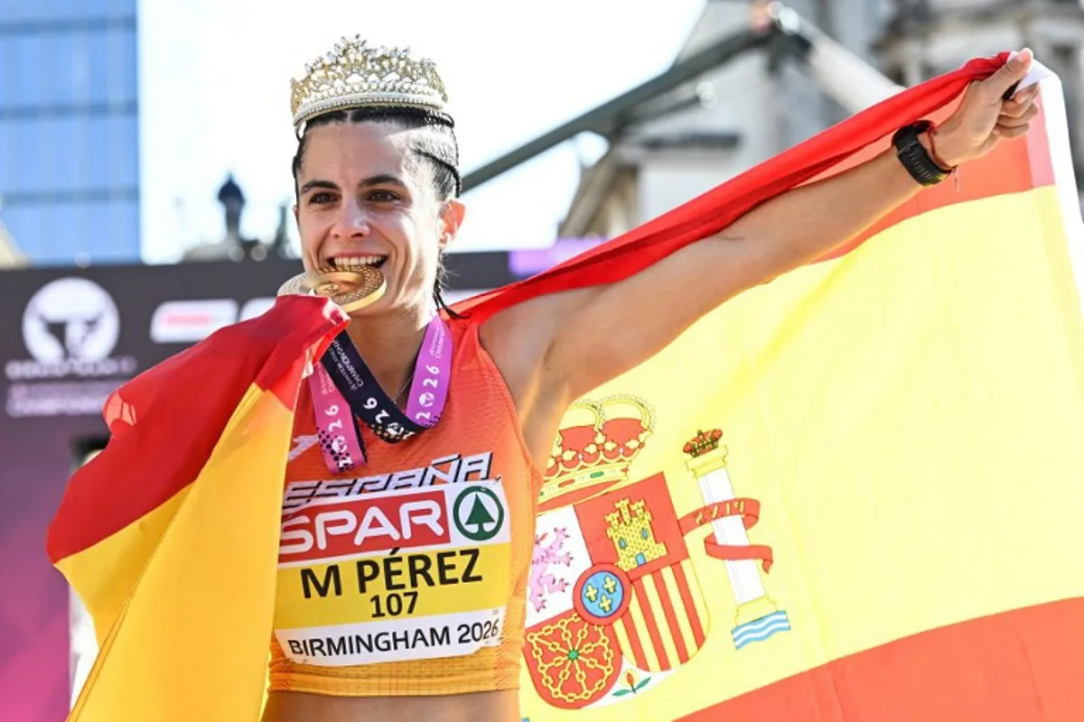 Gold medallist Spain's Maria Perez celebrates after winning the women's half marathon race walk during the European Athletics Championships in Birmingham on August 15, 2026. Paul ELLIS / AFP