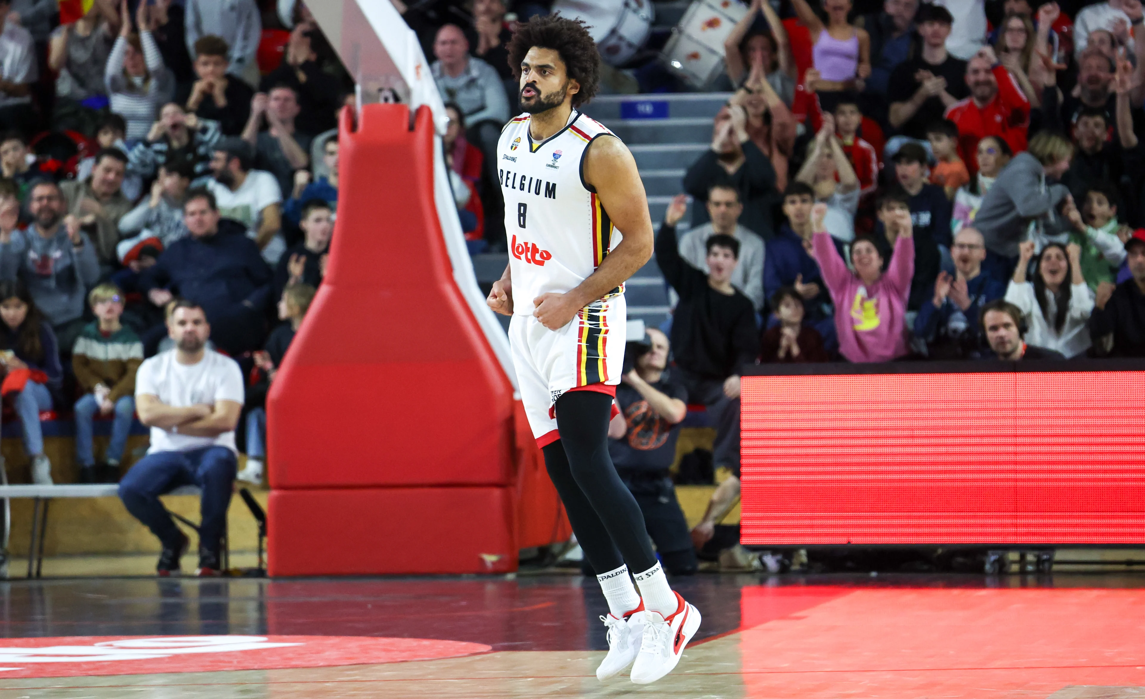 Belgium's Jean-Marc Mwema celebrates after scoring during a basketball match between Belgium's national team Belgian Lions and Spain, Sunday 25 February 2024 in Charleroi, game 2/6 in the group stage for the Euro 2025 qualifications. BELGA PHOTO VIRGINIE LEFOUR