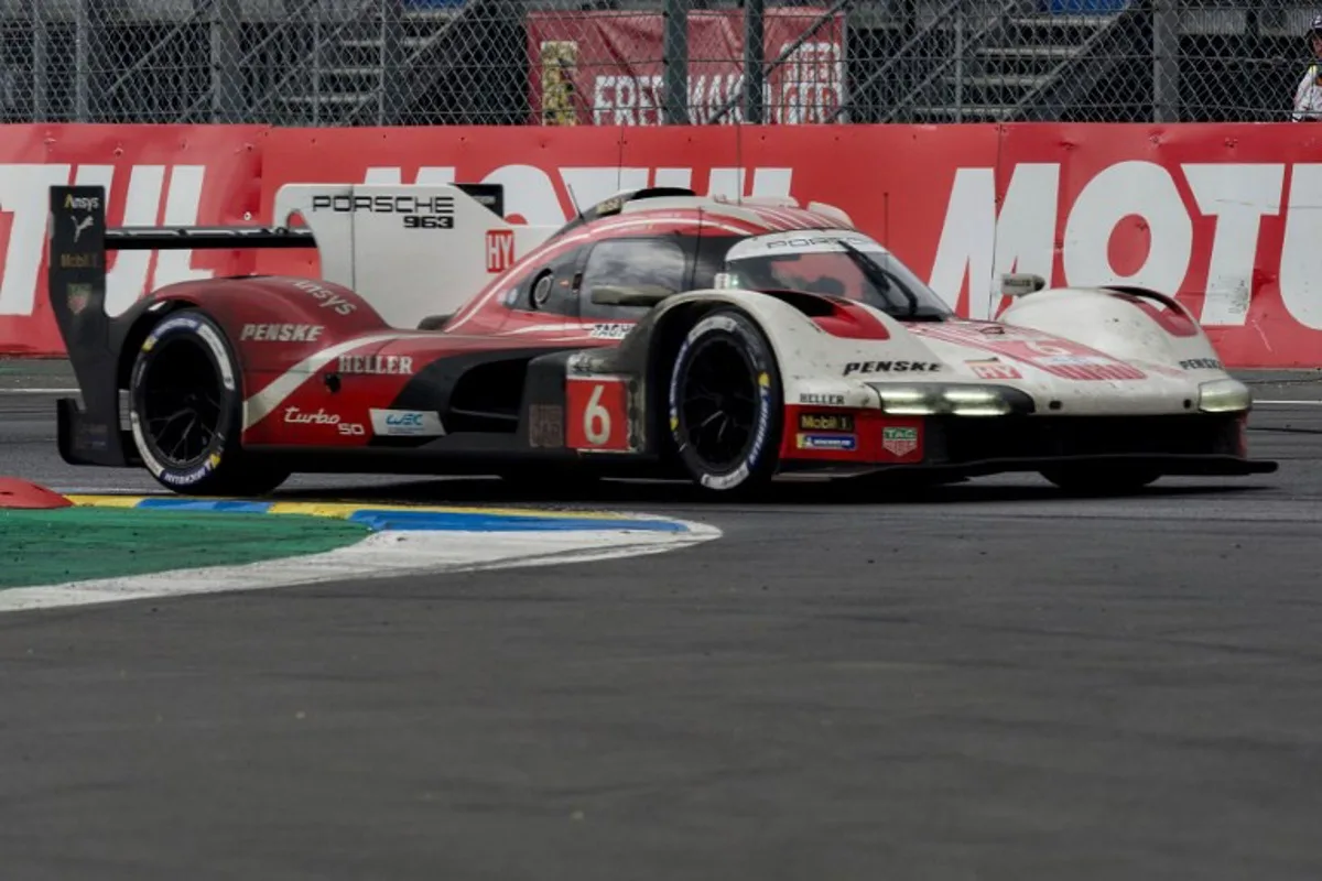 Belgian driver Laurens Vanthoor steers the Porsche 963 during Le Mans 24-hours endurance race in Le Mans, western France, on June 16, 2024.   GUILLAUME SOUVANT / AFP