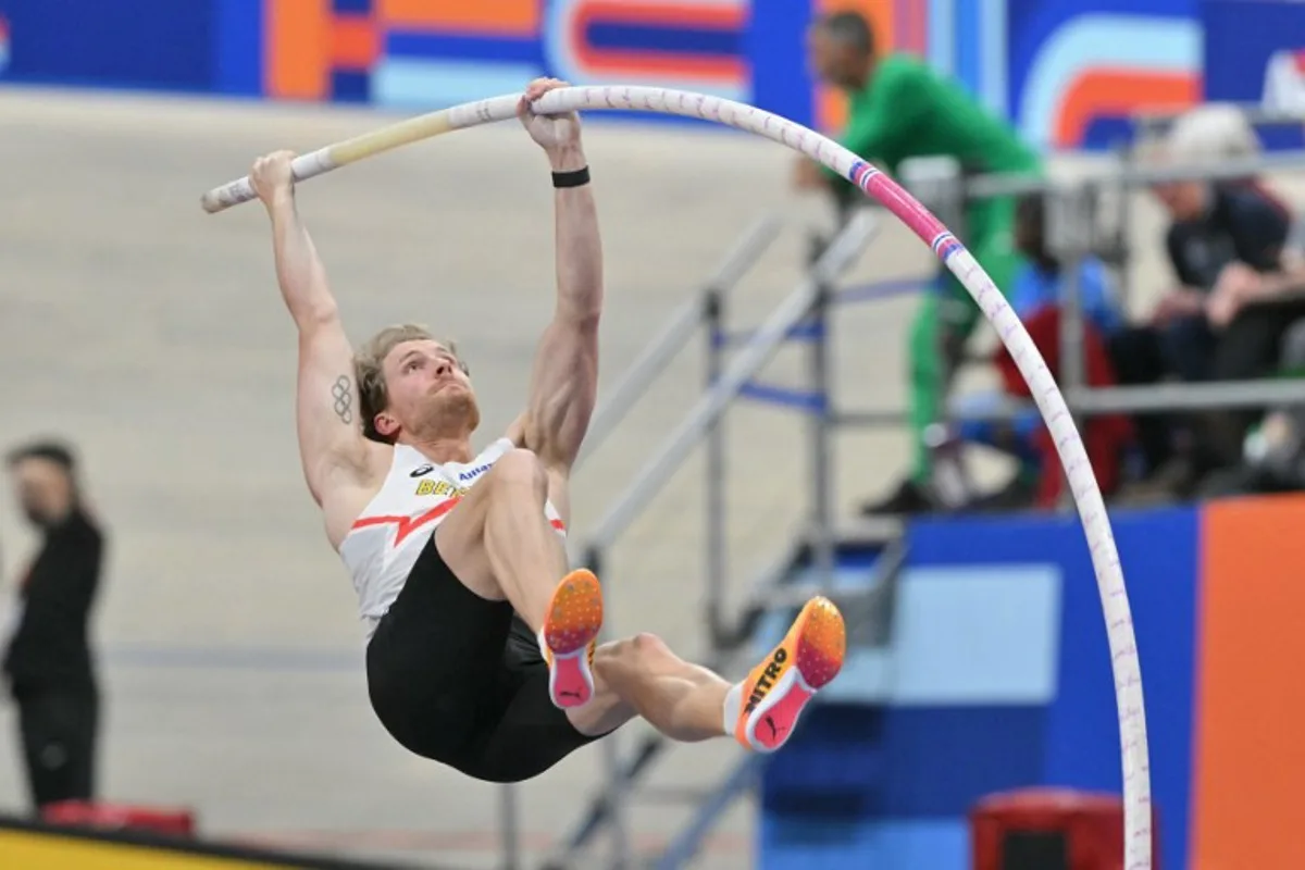 Belgium's Ben Broeders competes in the qualification round of the men's pole vault event during the European Athletics Indoor Championships at Omnisport in Apeldoorn, on March 7, 2025. NICOLAS TUCAT / AFP