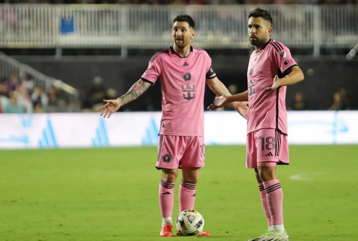 Inter Miami's Argentine forward #10 Lionel Messi and Inter Miami's Spanish defender #18 Jordi Alba gesture during the Major League Soccer (MLS) match between Inter Miami CF and Colorado Rapids at Chase stadium in Fort Lauderdale, Florida, April 6, 2024. Chris ARJOON / AFP