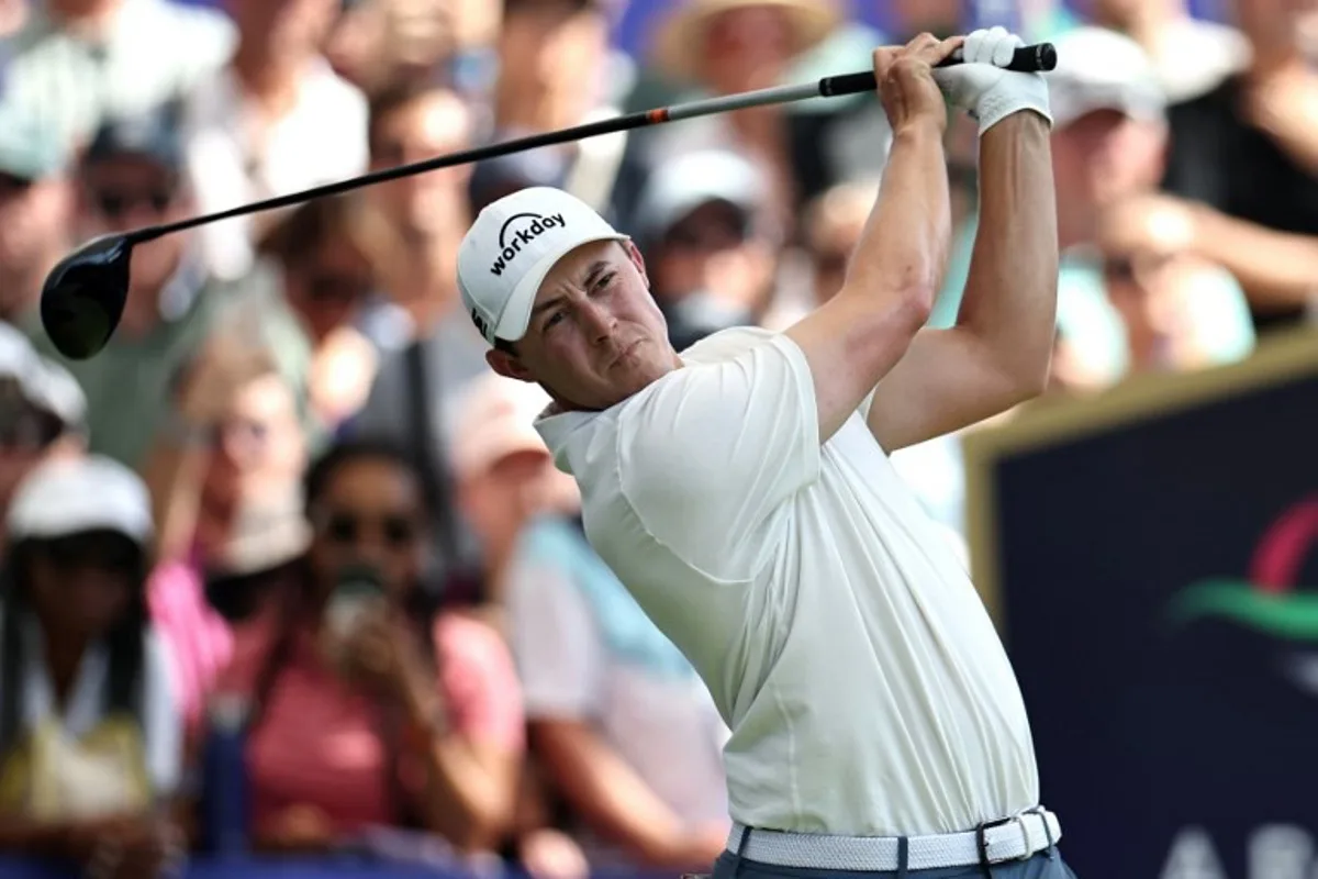 England's Matt Fitzpatrick plays a shot on day four of the DP World Tour Championship 2025 at Jumeirah Golf Estates in Dubai on November 16, 2025. Fadel SENNA / AFP