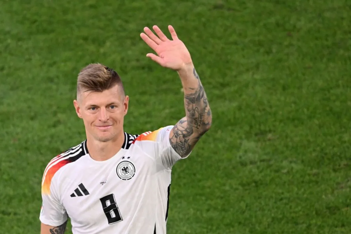 Germany's midfielder #08 Toni Kroos gestures at the end of the UEFA Euro 2024 quarter-final football match between Spain and Germany at the Stuttgart Arena in Stuttgart on July 5, 2024.  Kirill KUDRYAVTSEV / AFP