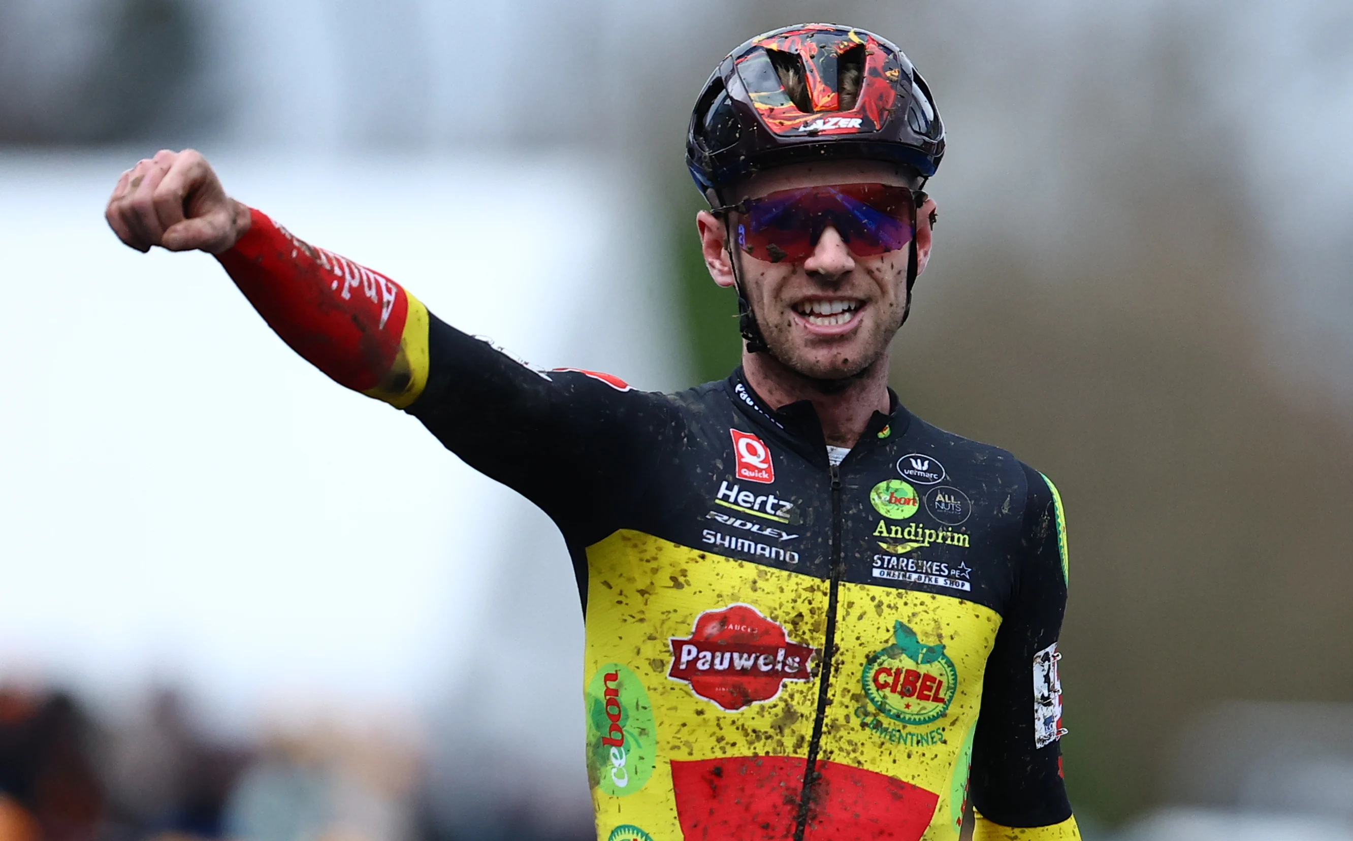 Belgian Eli Iserbyt celebrates as he crosses the finish line to win the men's elite race of the 'GP Sven Nys' cyclocross cycling event on Wednesday 01 January 2025 in Baal, stage 5/8 in the X2O Badkamers 'Trofee Veldrijden' competition. BELGA PHOTO DAVID PINTENS