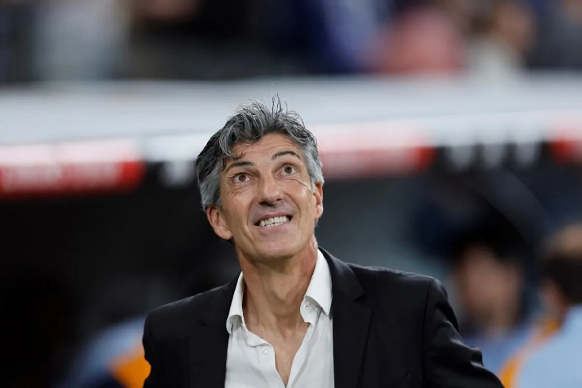 Real Sociedad's Spanish coach Imanol Alguacil looks on during the Spanish Copa del Rey (King's Cup) semi-final second leg football match between Real Madrid CF and Real Sociedad at the Santiago Bernabeu stadium in Madrid on April 1, 2025. OSCAR DEL POZO / AFP