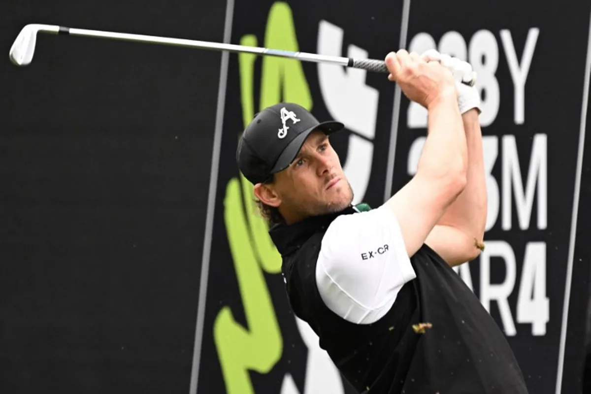 LIV team 4ACES GC player Thomas Pieters of Belgium tees off on day one of the LIV Golf tournament at Fanling golf club in Hong Kong on March 7, 2025.  Peter PARKS / AFP