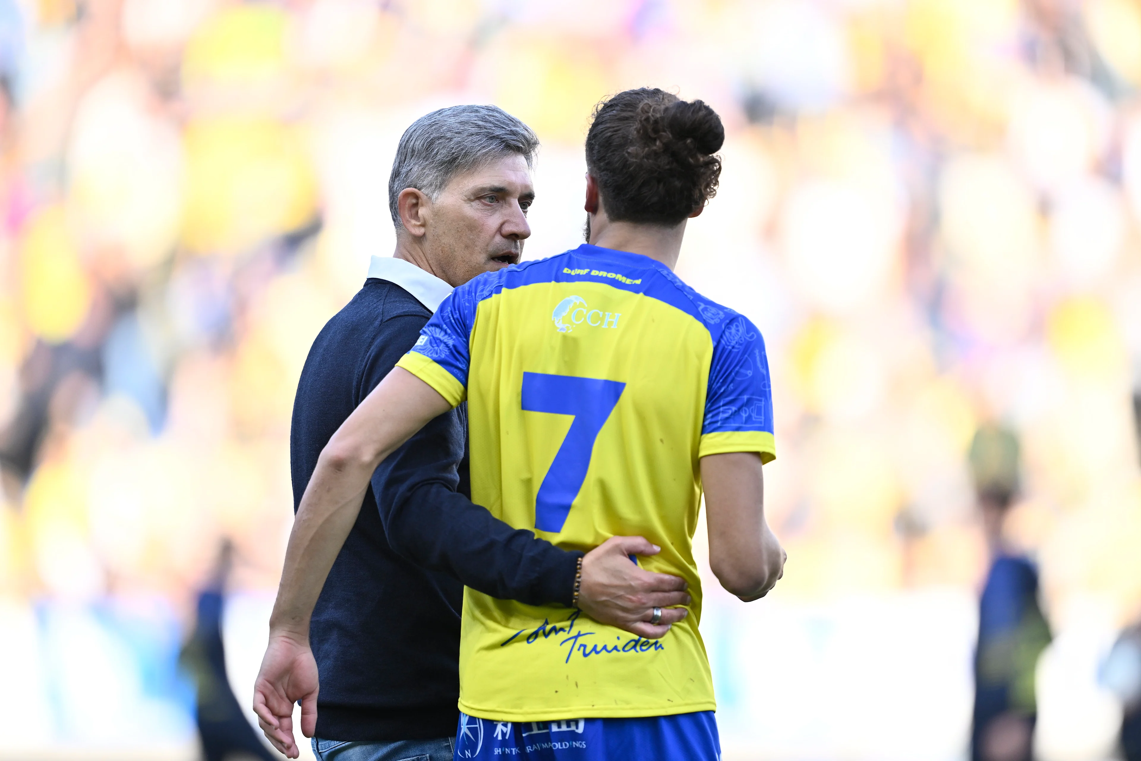 STVV's new head coach Felice Mazzu and STVV's Billal Brahimi pictured during a soccer match between STVV and OH Leuven, in Sint-Truiden, on the seventh day of the 2024-2025 season of the 'Jupiler Pro League' first division of the Belgian championship, Sunday 15 September 2024. BELGA PHOTO JOHAN EYCKENS