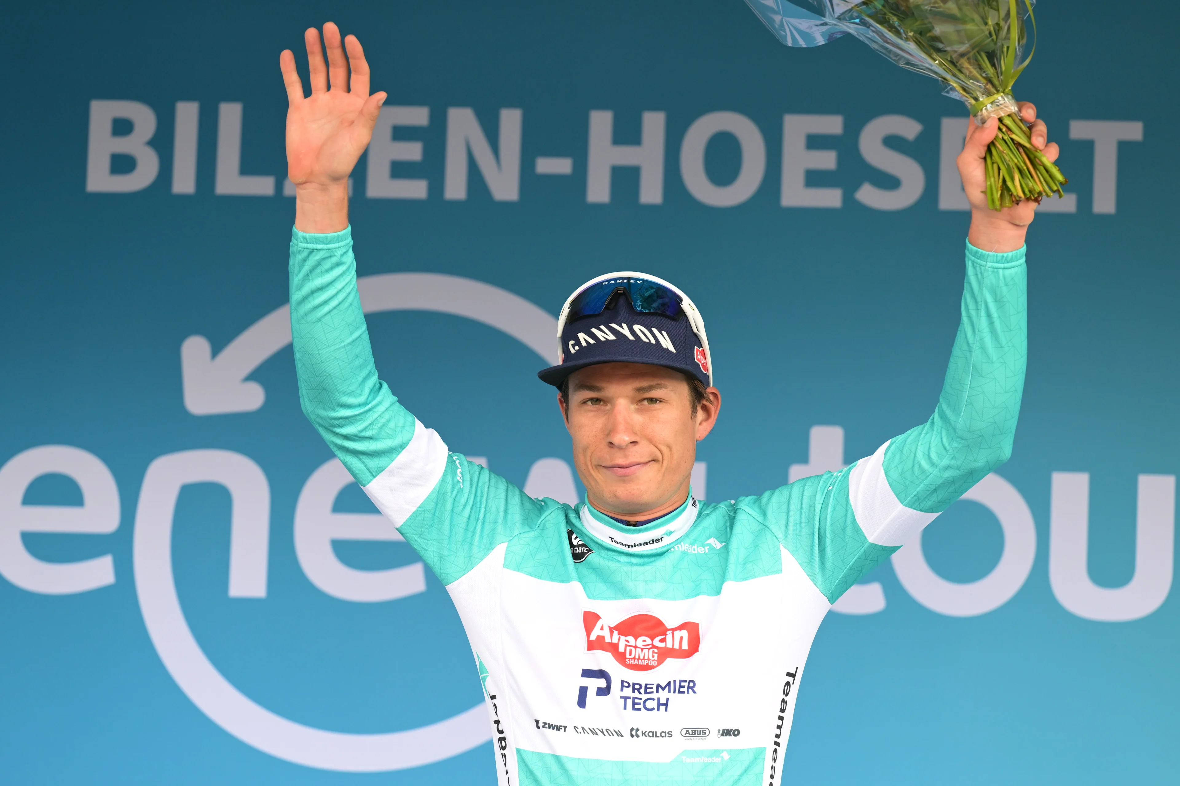 Belgian Jasper Philipsen of Alpecin-Premier Tech celebrates on the podium after winning stage four of the 'Renewi Tour' multi-stage cycling race, from Riemst to Bilzen-Hoeselt (187,3 km) on Saturday 22 August 2026. The five-day race takes place from 19 to 23/08. BELGA PHOTO DAVID PINTENS
