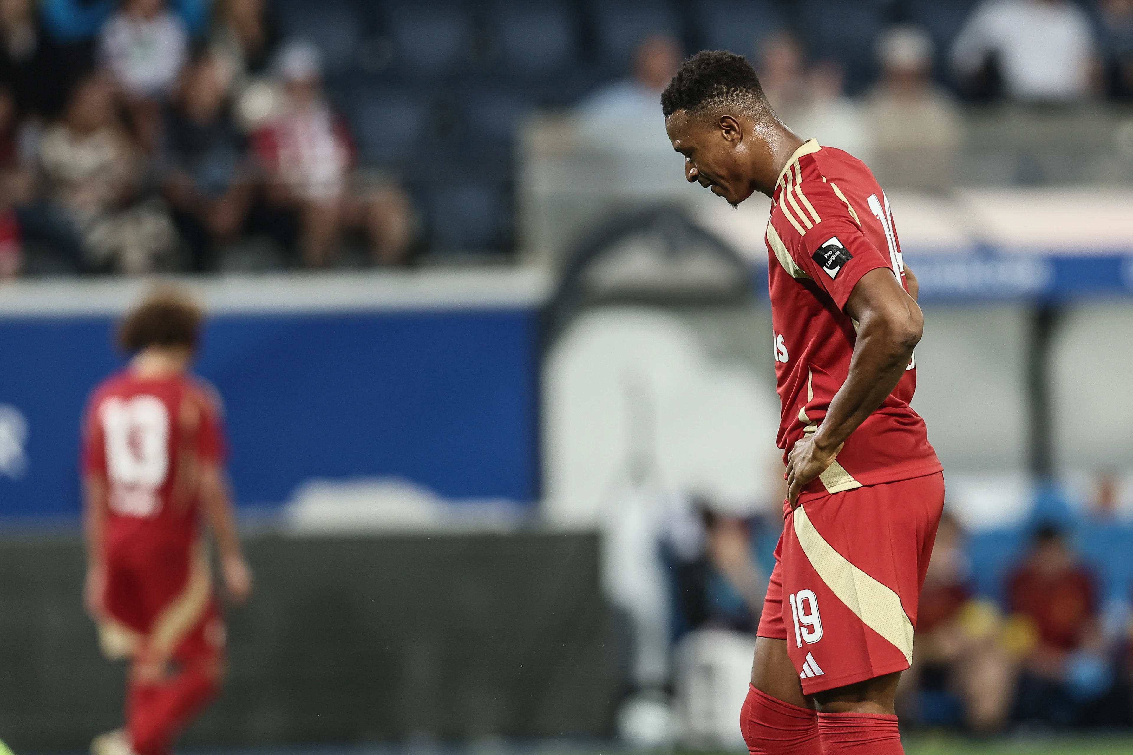 Standard's Muhammed Badamosi looks dejected during a soccer match between OH Leuven and Standard de Liege, Saturday 31 August 2024 in Leuven, on the sixth day of the 2024-2025 season of the 'Jupiler Pro League' first division of the Belgian championship. BELGA PHOTO BRUNO FAHY