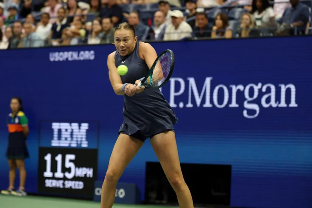 USA's Amanda Anisimova plays a shot to Belarus's Aryna Sabalenka in the women's singles final tennis match on day fourteen of the US Open tennis tournament at the USTA Billie Jean King National Tennis Center in New York City on September 6, 2025. TIMOTHY A.CLARY / AFP