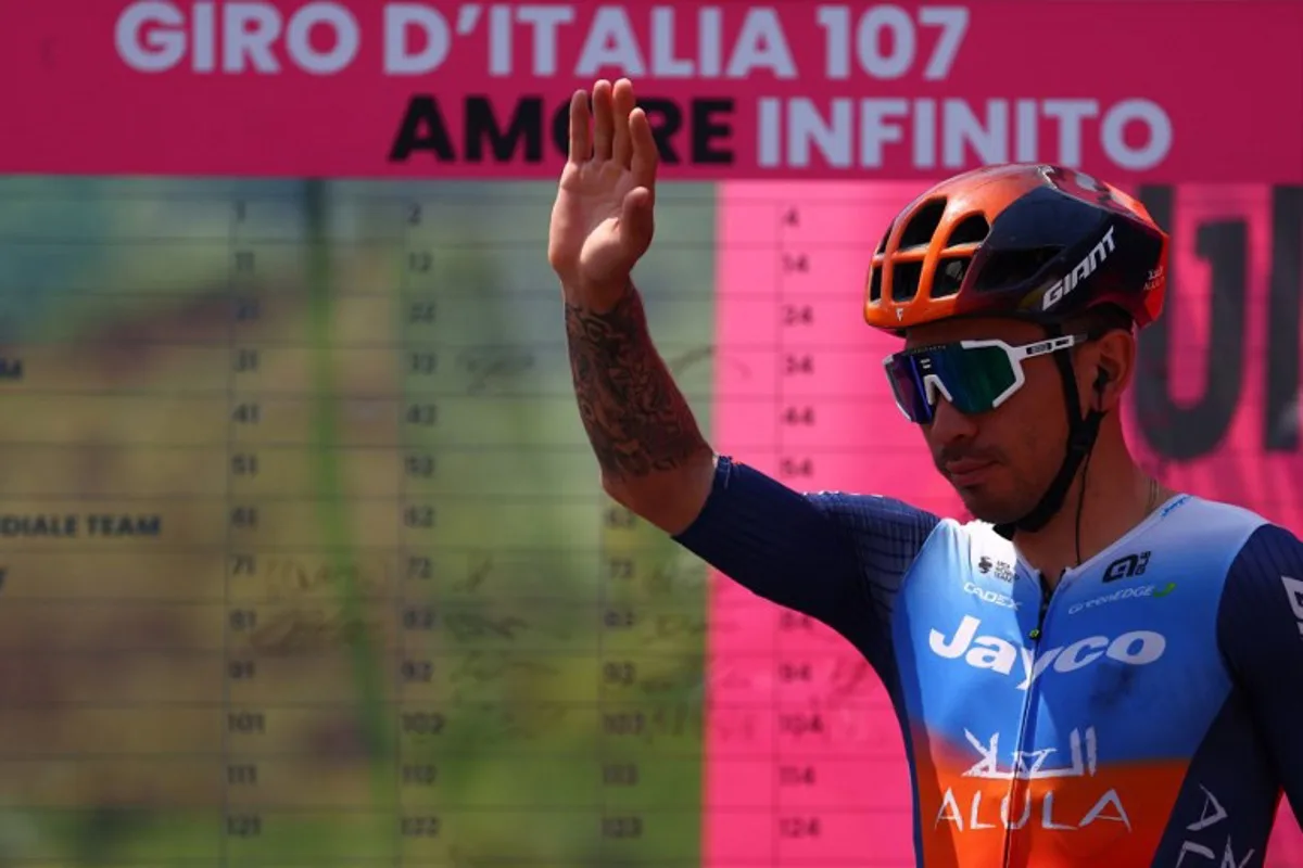 Team Jayco-AlUla's Australian rider Caleb Ewan waves on stage prior the 11th stage of the 107th Giro d'Italia cycling race, 207km between Foiano di Val Fortore and Franca Villa al Mare, on May 15, 2024.   Luca Bettini / AFP