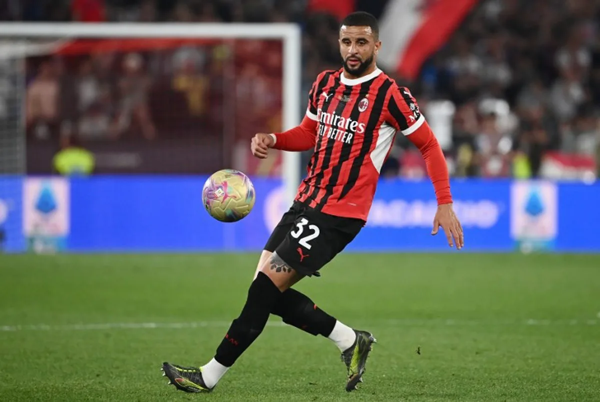 AC Milan's British defender #32 Kyle Walker controls the ball during the Italian Cup (Coppa Italia) final football match between AC Milan and Bologna at the Olympic stadium in Rome, on May 14, 2025. Isabella BONOTTO / AFP