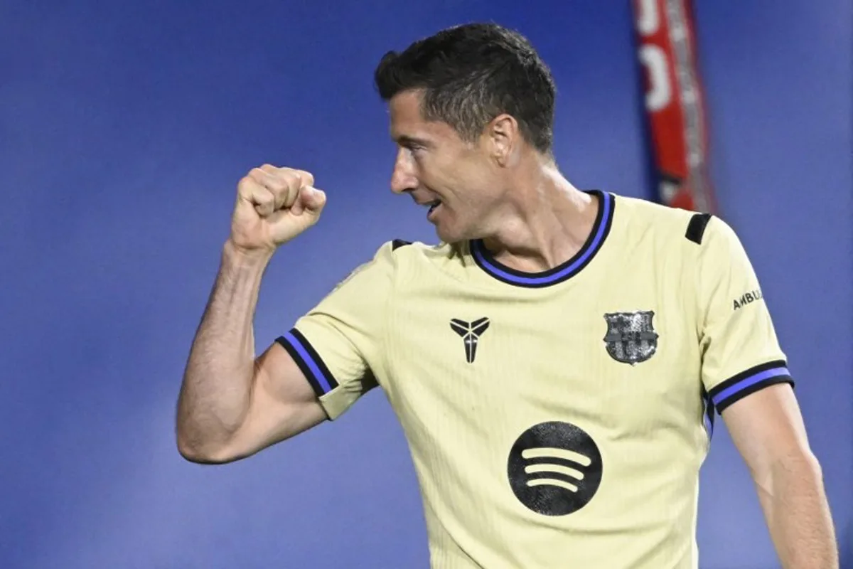Barcelona's Polish forward #09 Robert Lewandowski celebrates scoring the opening goal during the Spanish league football match between CA Osasuna and FC Barcelona at El Sadar Stadium in Pamplona on May 2, 2026.  ANDER GILLENEA / AFP