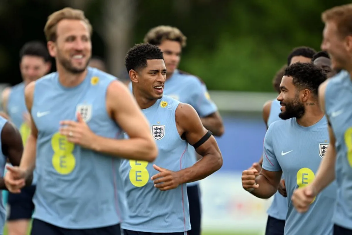 England's midfielder #10 Jude Bellingham (2ndL) and England's defender #24 Reece James take part in a training session as part of the team's preparation for its FIFA World Cup football tournament opening match against Croatia at the team's training camp in Palm Beach Gardens on June 9, 2026. CHANDAN KHANNA / AFP