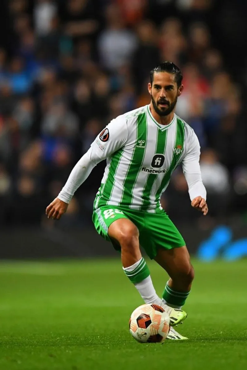 Real Betis' Spanish midfielder #22 Isco controls the ball during the UEFA Europa League group C football match between Glasgow Rangers and Real Betis at Ibrox Stadium in Glasgow, Scotland, on September 21, 2023. ANDY BUCHANAN / AFP
