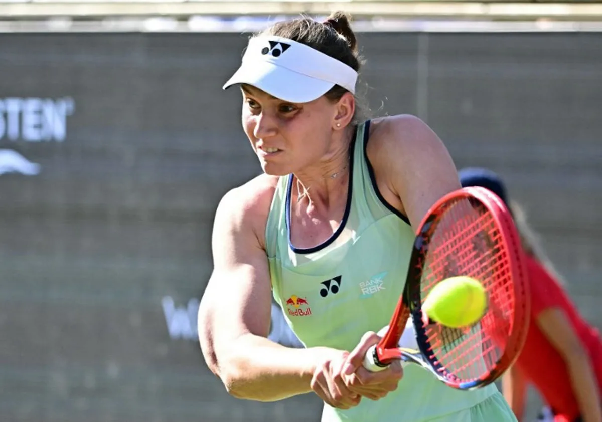 Kazakhstan's Elena Rybakina returns a ball to Belarus' Aryna Sabalenka during their match at the WTA tennis tournament in Berlin, Germany, on June 20, 2025. Tobias SCHWARZ / AFP