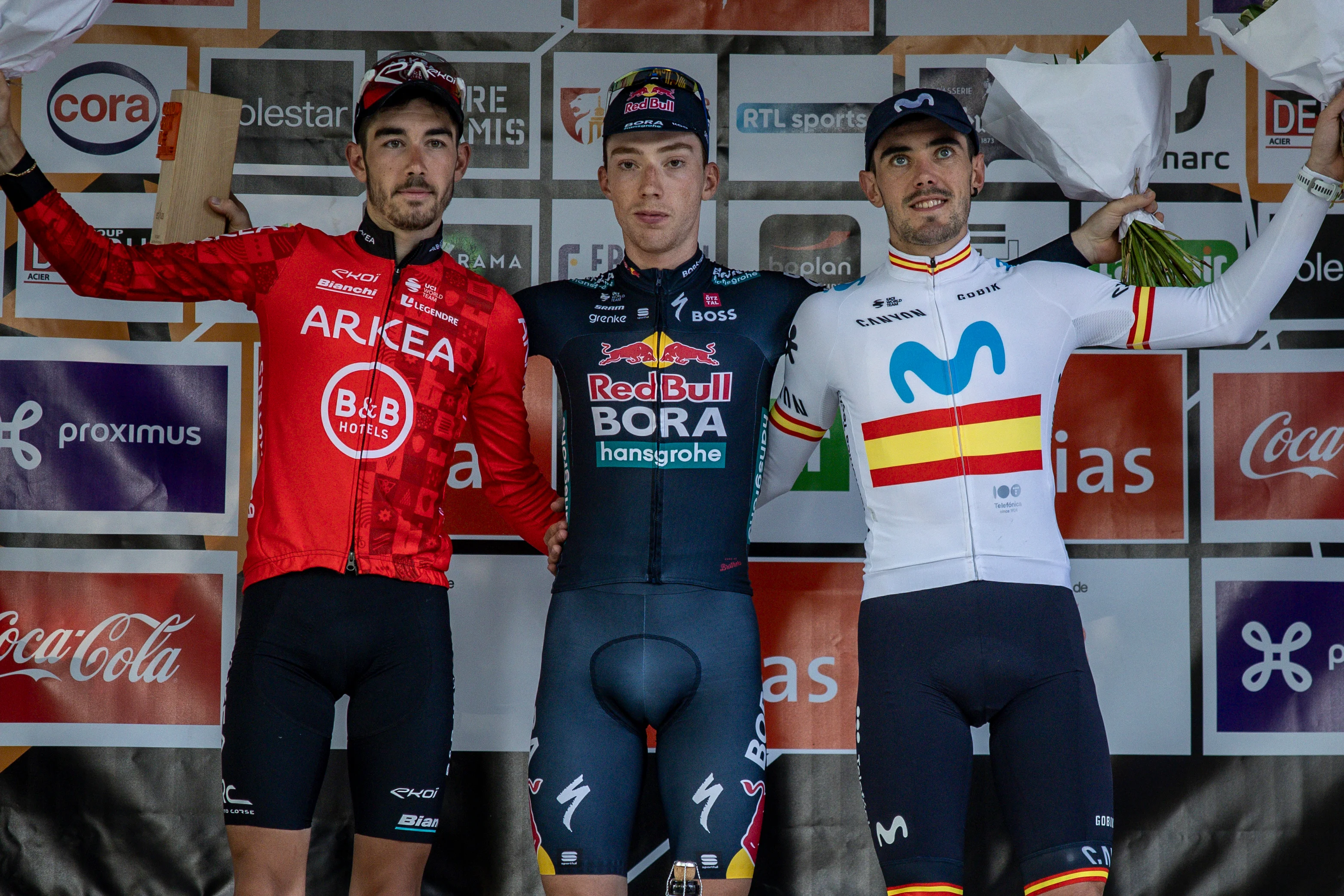 French Clement Champoussin of Arkea-BB Hotels, Spanish Roger Adria of Red Bull-Bora-Hansgrohe and Alex Aranburu of Movistar Team pictured on the podium after the one day cycling race Grand Prix de Wallonie 2024 (202,3 km), from Blegny to the Citadelle de Namur, in Namur, on Wednesday 18 September 2024. BELGA PHOTO DAVID PINTENS