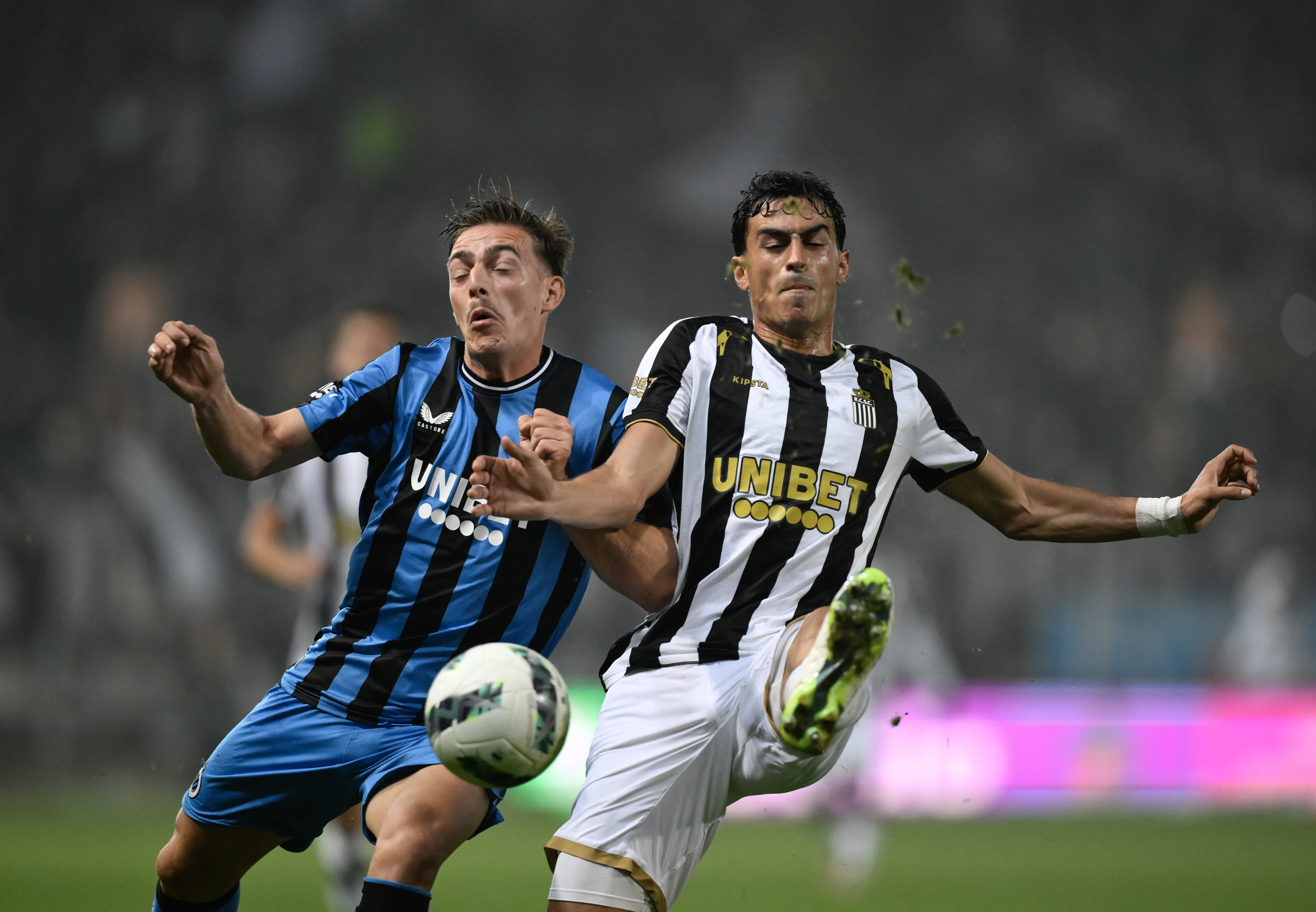 Club's Casper Nielsen and Charleroi's Stelios Andreou fight for the ball during a soccer match between Sporting Charleroi and Club Brugge KV, Friday 27 September 2024 in Charleroi, on day 9 of the 2024-2025 season of the 'Jupiler Pro League' first division of the Belgian championship. BELGA PHOTO JOHN THYS