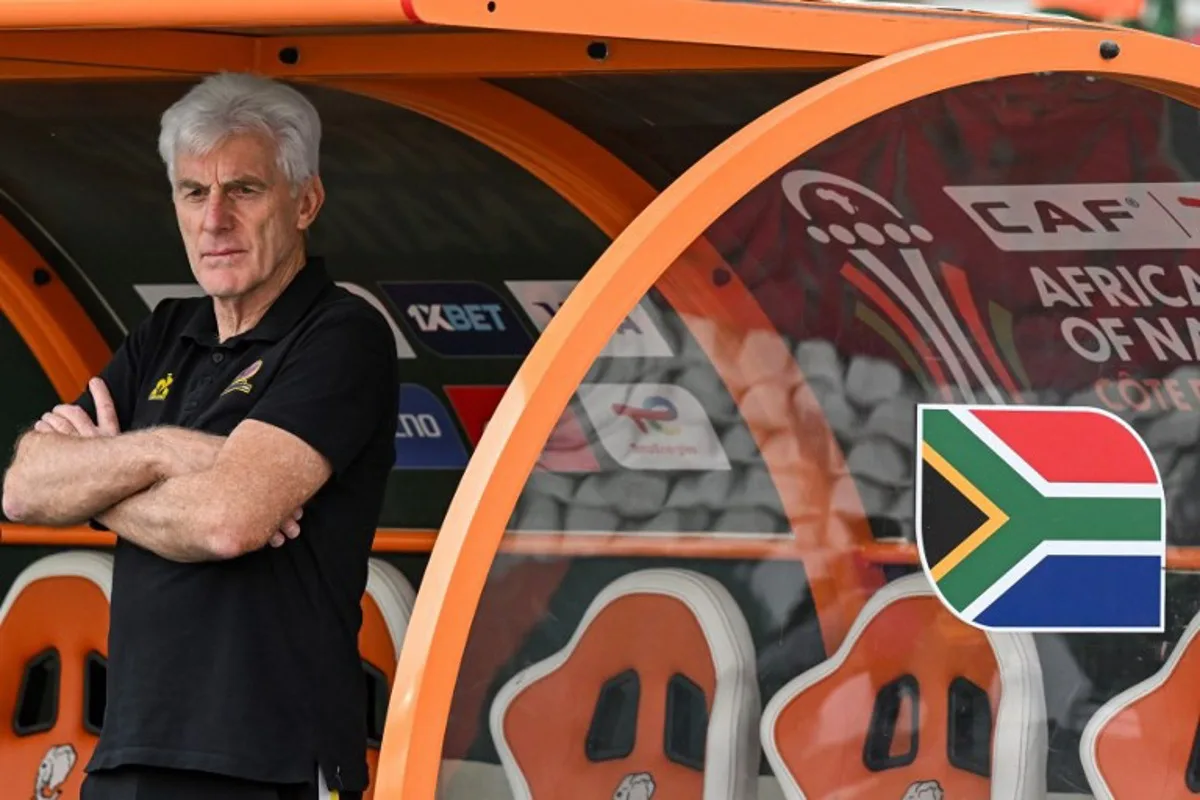 South Africa's head coach Hugo Broos looks on ahead of the Africa Cup of Nations (CAN) 2024 semi-final football match between Nigeria and South Africa at the Stade de la Paix in Bouake on February 7, 2024.  Issouf SANOGO / AFP