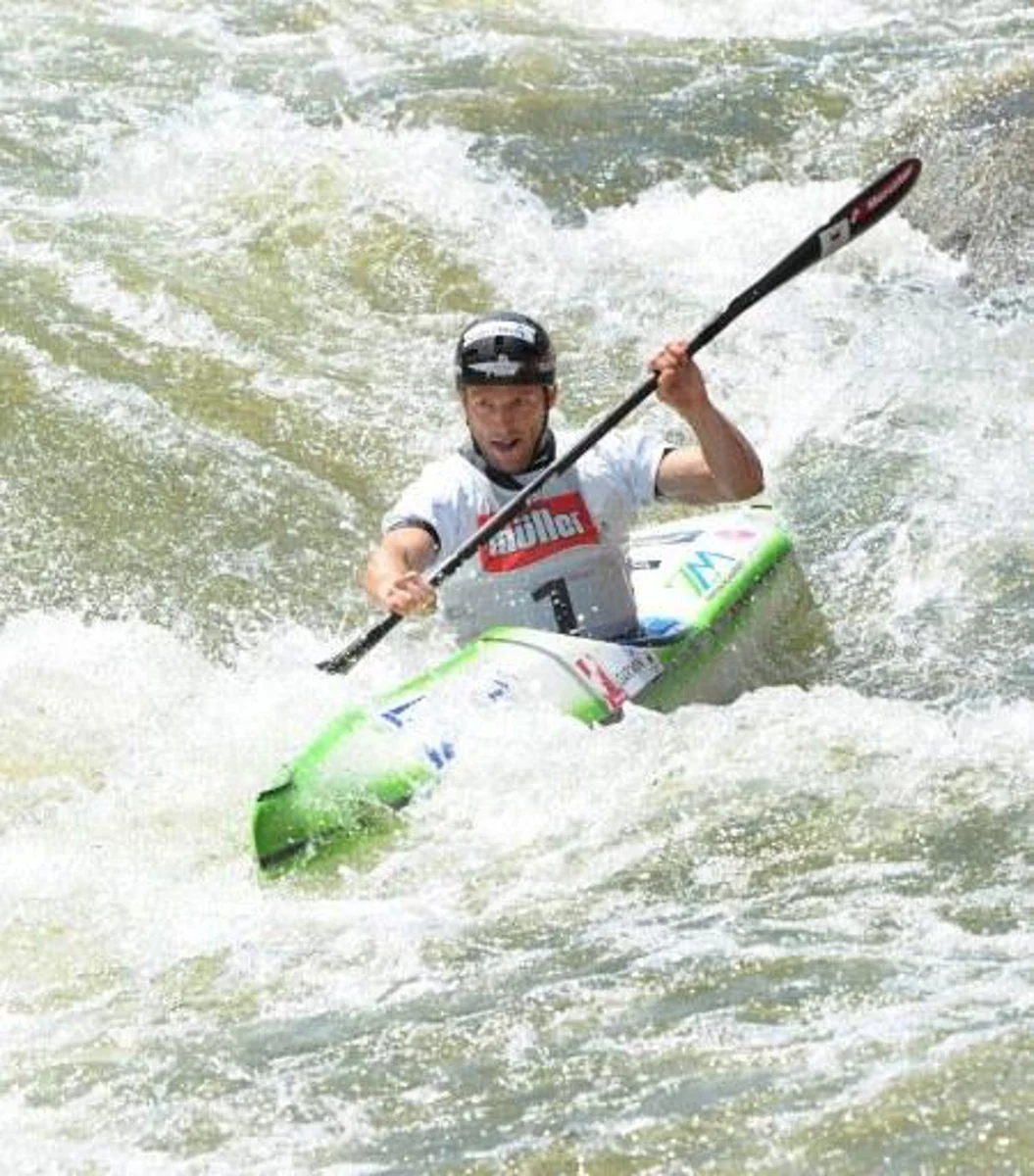 Slovenian Nejc Znidarcic competes in the Kayak K1 men race at the ICF Wildwater Canoeing Sprint World in the southern German city of Augsburg, on June 12, 2011. AFP PHOTO/CHRISTOF STACHE