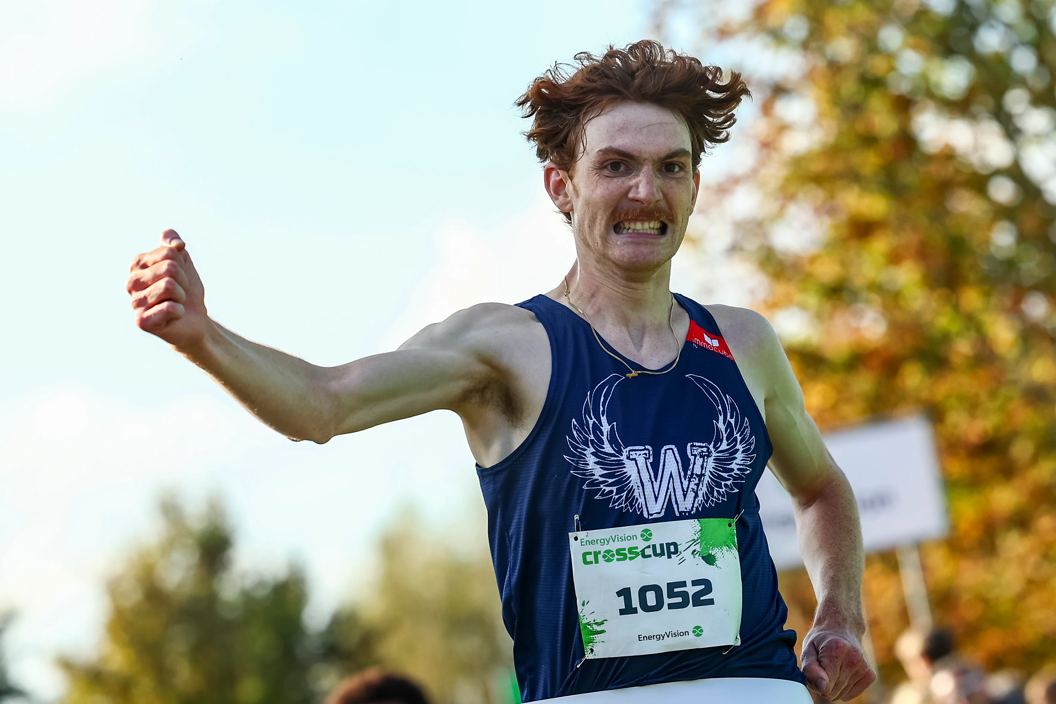 belgian Ruben Querinjean celebrates as he crosses the finish line to win the men's elite race at the CrossCup cross country running athletics event in Roeselare, the second stage of the CrossCup competition, Sunday 27 October 2024. BELGA PHOTO DAVID PINTENS