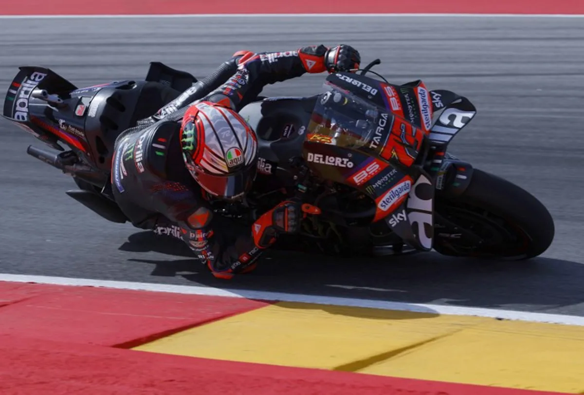 Team Aprilia Racing's Marco Bezzecchi takes a curve during the first free practice at the Motorland circuit in Alcaniz, northeastern Spain, on the eve of the Moto GP Aragon Grand Prix, on August 28, 2026.  Pierre-Philippe MARCOU / AFP