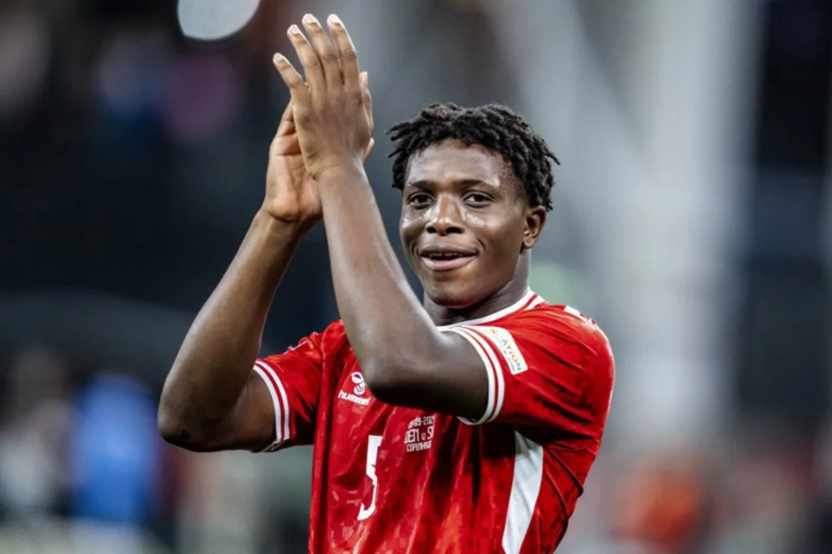 Denmark's defender #05 Patrick Dorgu celebrates after scoring his team's first goal during the UEFA Nations League football match League A, Group A4, Day 1, Denmark v Switzerland in the Parken stadium in Copenhagen, Denmark, on September 5, 2024.  Mads Claus Rasmussen / Ritzau Scanpix / AFP