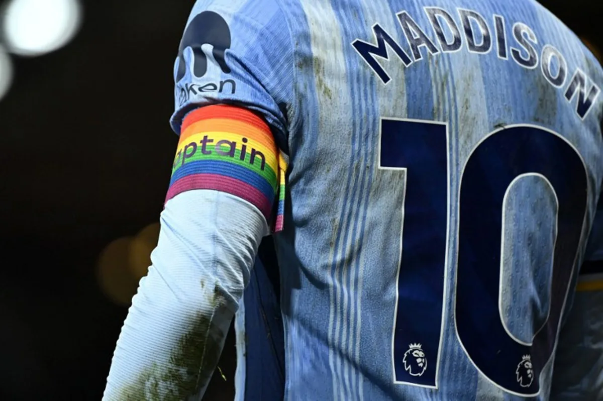 Tottenham Hotspur's English midfielder #10 James Maddison wears the rainbow captains armband during the English Premier League football match between Bournemouth and Tottenham Hotspur at the Vitality Stadium in Bournemouth, southern England on December 05, 2024. JUSTIN TALLIS / AFP