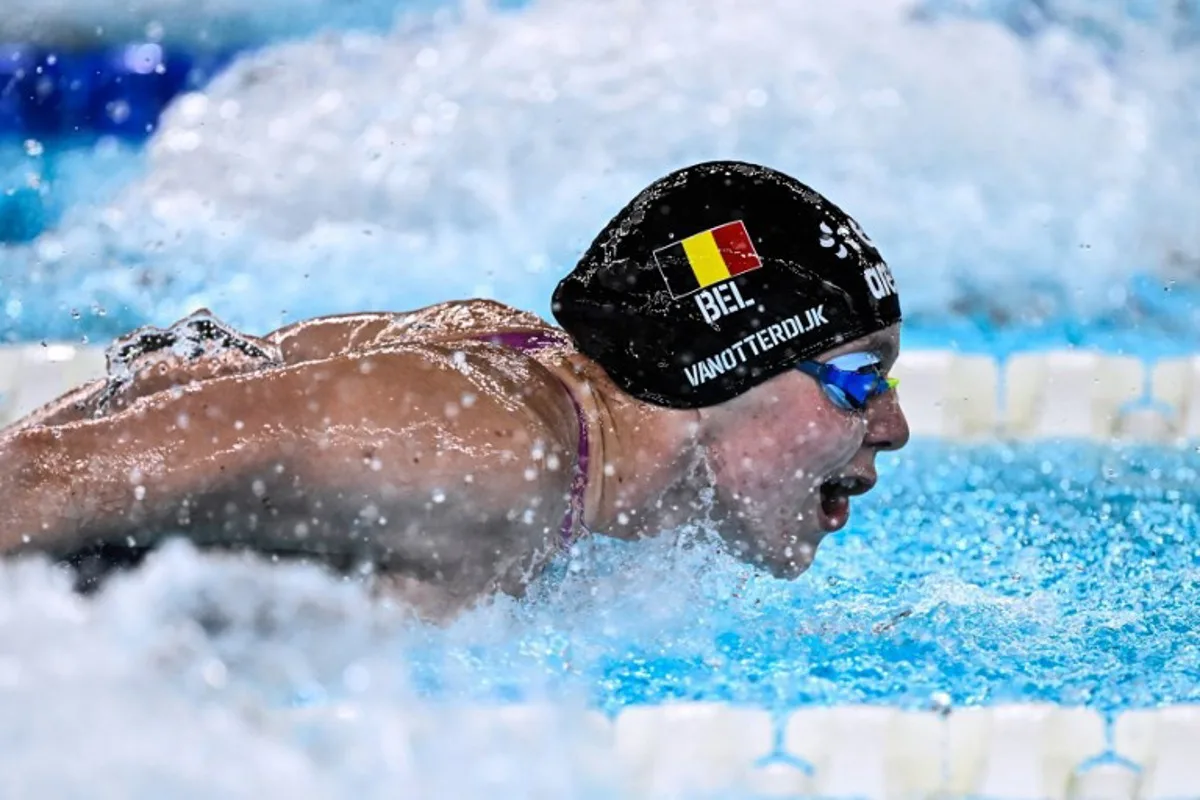 Belgium's Roos Vanotterdijk competes in the final of the women's 100m butterfly swimming event during the LEN European Aquatics Championships at the Olympic Aquatic Centre in Saint-Denis, northern suburbs of Paris, on August 14, 2026. JULIEN DE ROSA / AFP