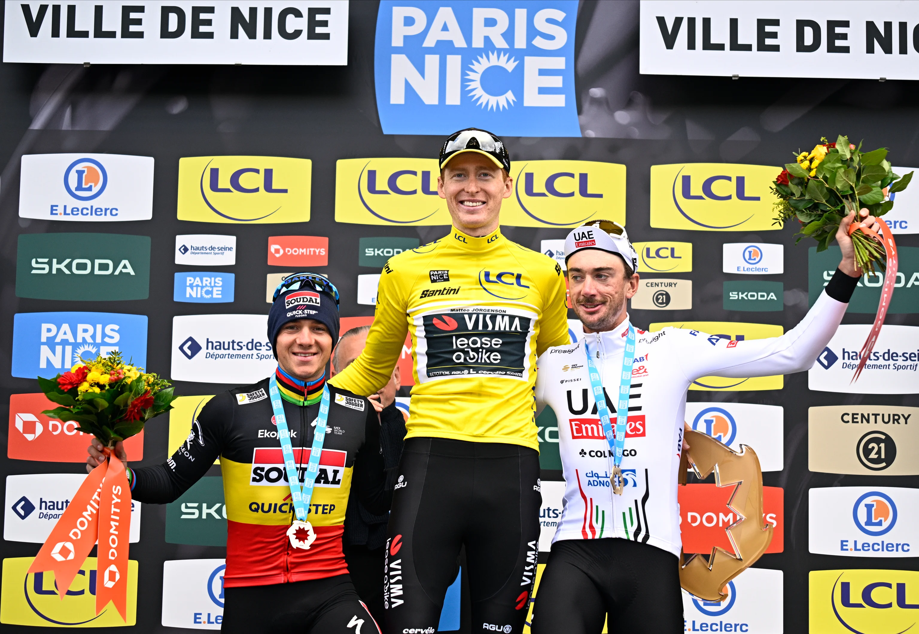 Belgian Remco Evenepoel of Soudal Quick-Step, US Matteo Jorgenson of Team Visma-Lease a Bike and US Brandon McNulty of UAE Team Emirates celebrate on the podium after the final stage of the Paris-Nice eight days cycling stage race, 109,5km with start and finish in Nice, France, Sunday 10 March 2024. BELGA PHOTO JASPER JACOBS