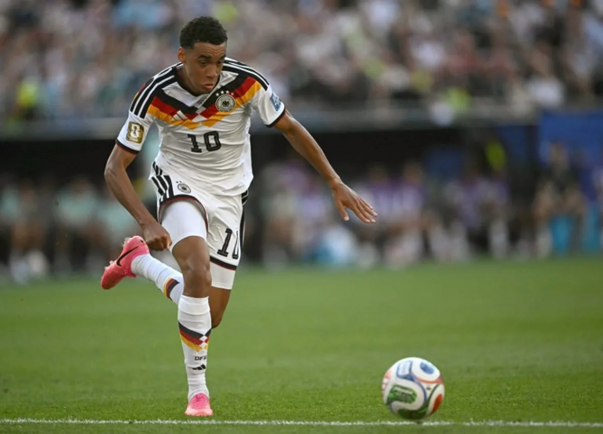 Germany's midfielder #10 Jamal Musiala controls the ball during the 2026 World Cup round of 32 football match between Germany and Paraguay at the Boston Stadium in Foxborough on June 29, 2026. MAURO PIMENTEL / AFP