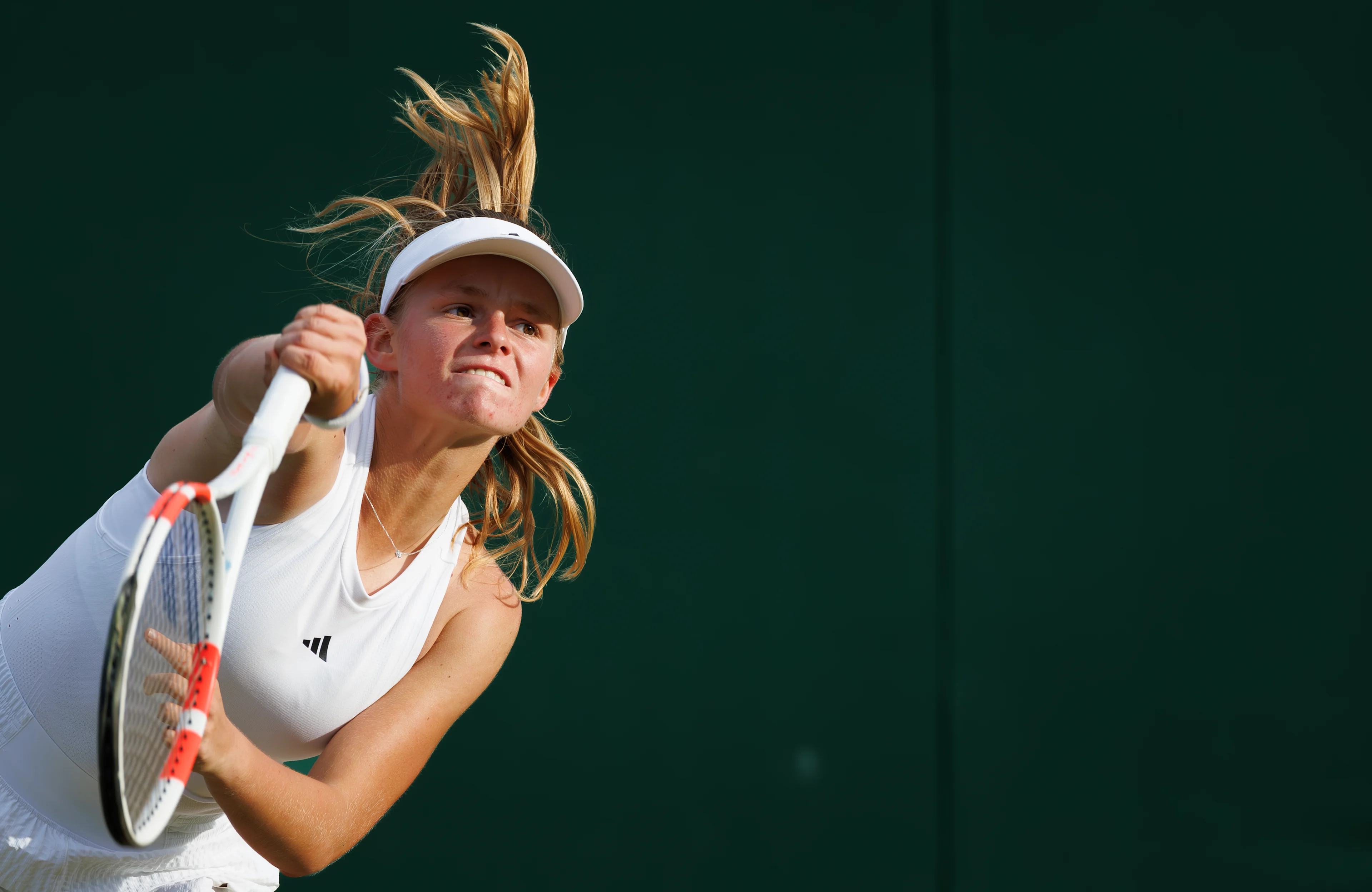 Belgian Jeline Vandromme pictured in action during a tennis match between Belgian Vandromme and Korean Jang, in round 1 of the girls singles of the 2024 Wimbledon grand slam tournament at the All England Tennis Club, in south-west London, Britain, Sunday 07 July 2024. BELGA PHOTO BENOIT DOPPAGNE